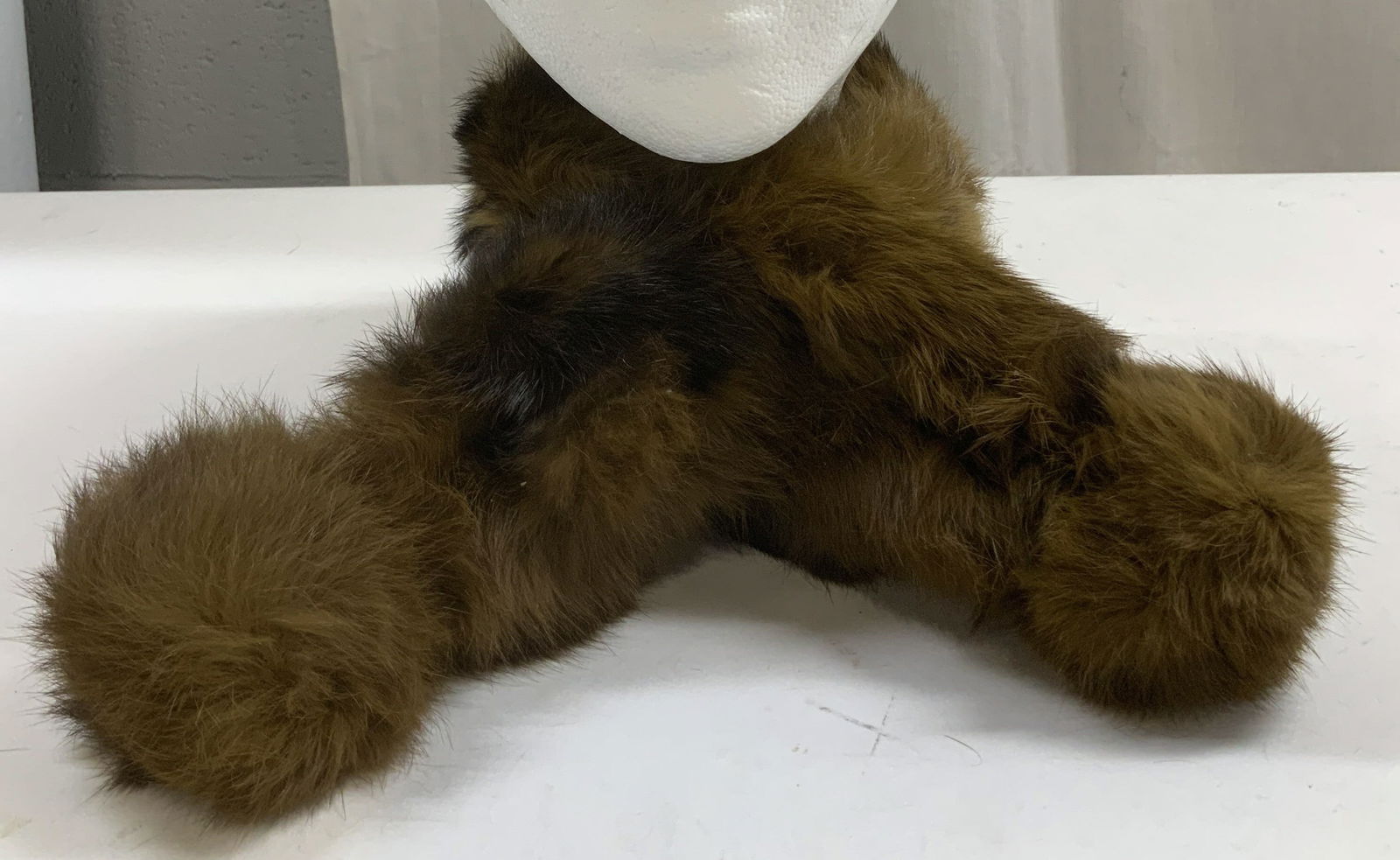 Vtg Brown Mink Fur Scarf: Vintage mink fur scarf is dark brown toned. Features various openings for adjustable purposes. No visible signature or markings. Surface wear consistent to age, use & exposure. Property of opera