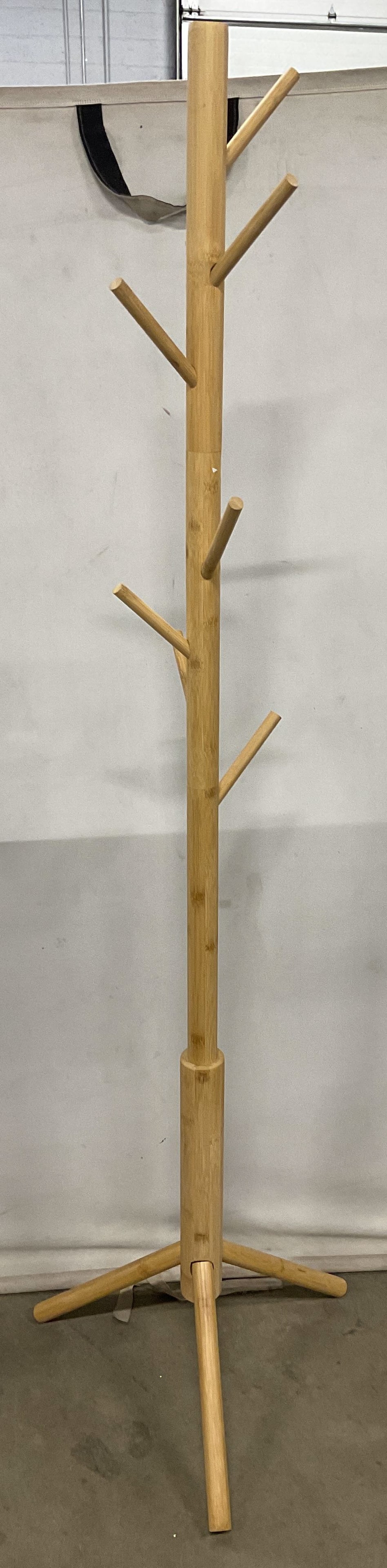Wood Tripod Coat Rack: Wood coat rack with tripod base. Measures approx. 19 x 68.25 inches. One piece needs replacement. Some scratching. Coat rack, wood coat rack, furniture, home decor, home accessories, 10 f