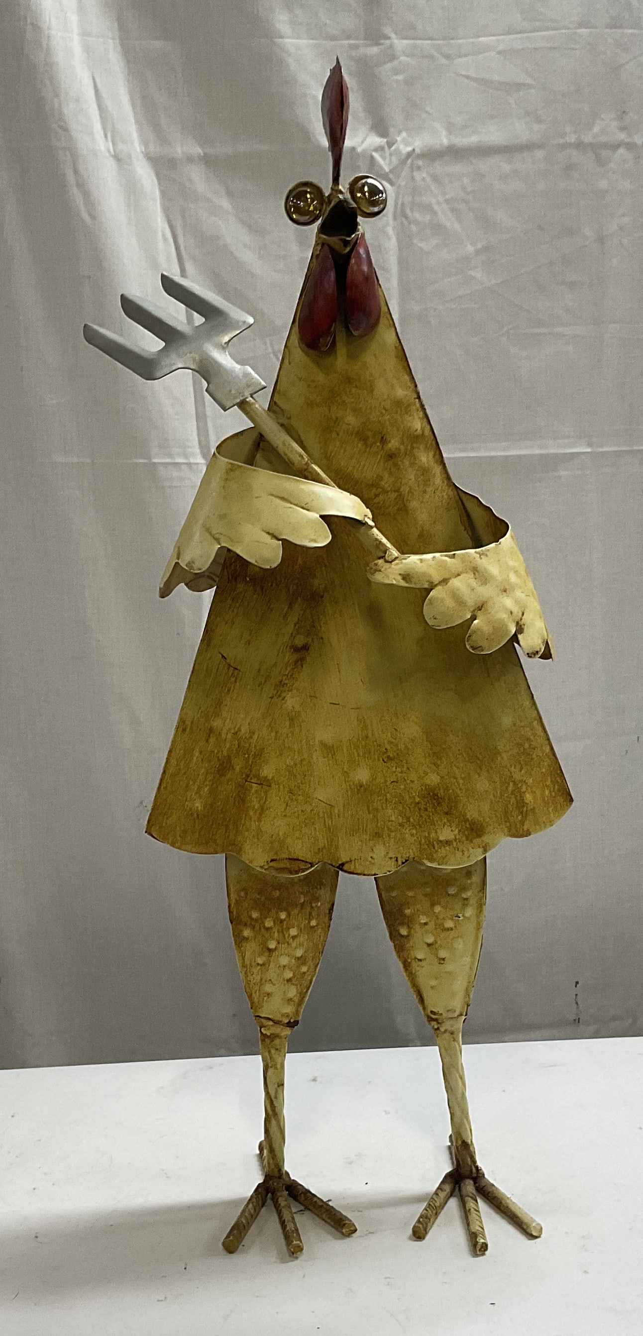 Metal Rooster Holding Pitchfork Statue 25in: Metal Rooster Holding Pitchfork Statue. Rustic style. Painted finish. Glass Pebble eyes. Durable for outdoors. Measures app 25.5in H x 8in W. home decor, table decor, decor, home accessories, collecti