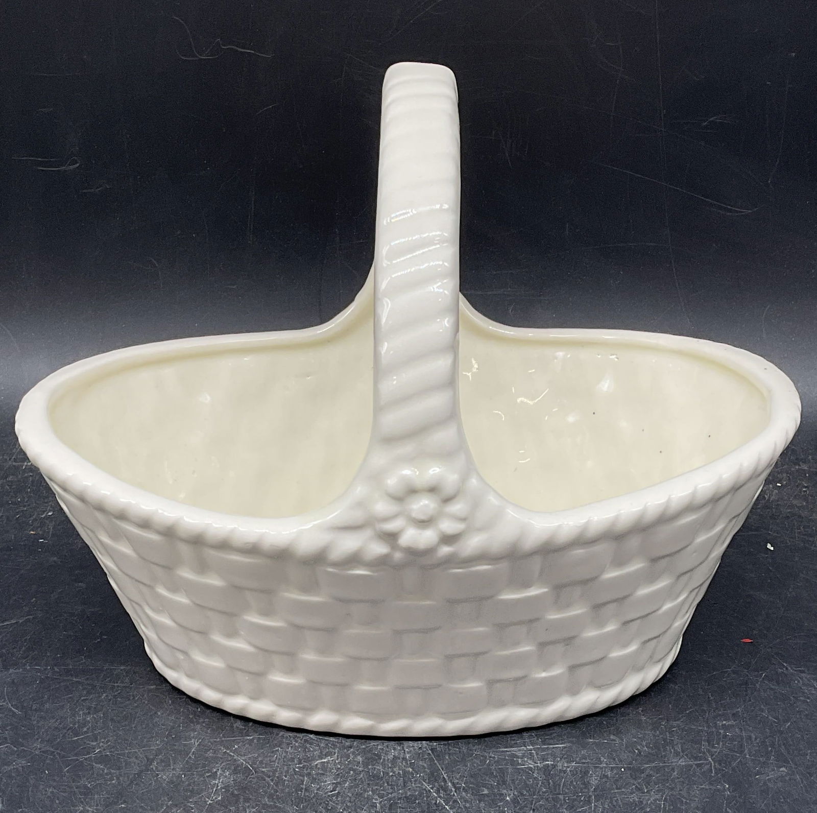 Vintage White Ceramic Basket with Handle: Vintage white ceramic basket with handle. Measures approx. 9 x 6.5 x 7 inches. Some scratching. Ceramic basket, white basket, home decor, home accessories, table decor, table accessories, 10 cs