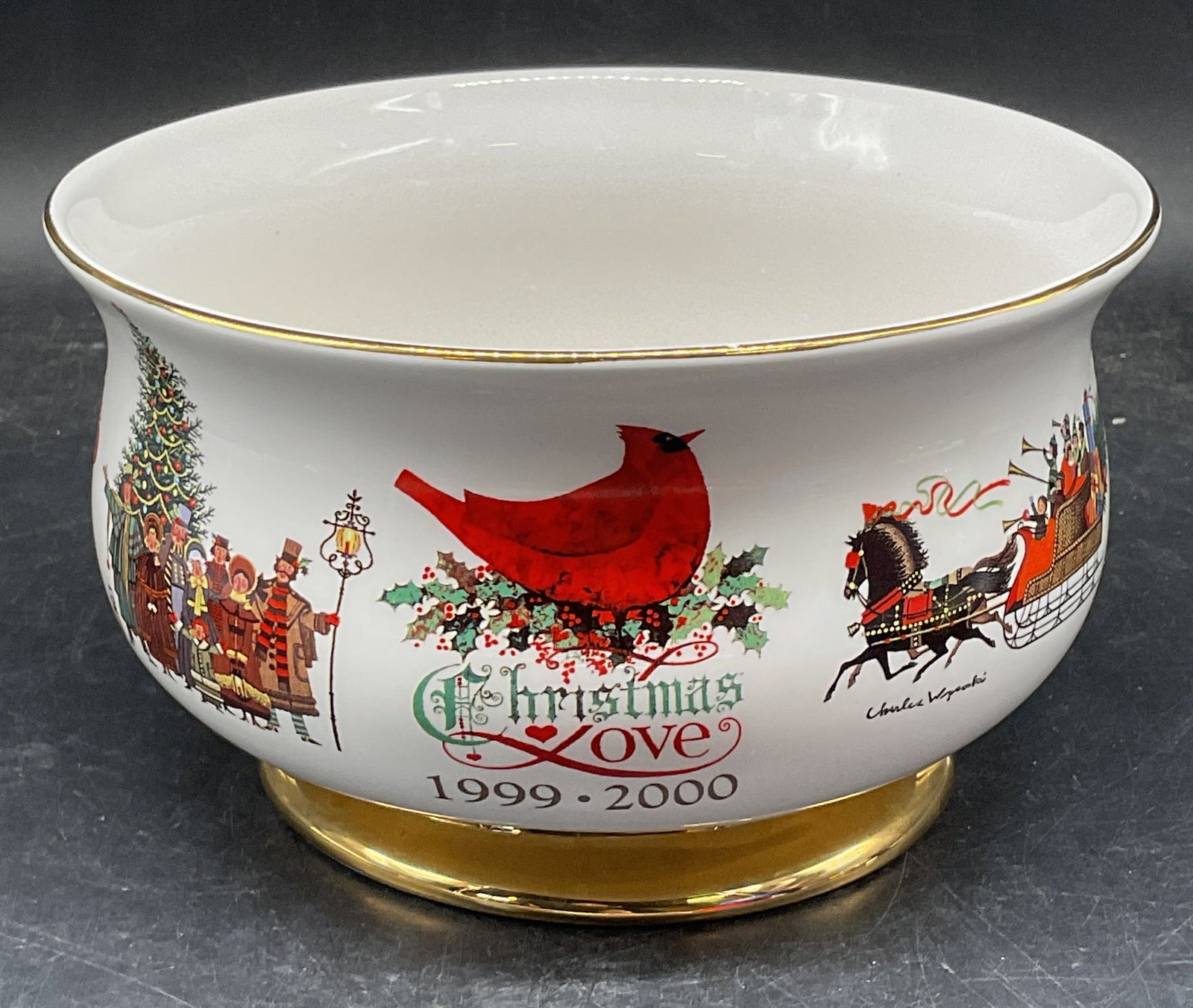 Vtg Wysocki TELEFLORA Porcelain Christmas Bowl: Vintage 1999-2000 Wysocki Teleflora porcelain Christmas bowl. Footed base with gilt borders. Christmas motifs. Measures approx. 7.75 x 4.5 inches. Some scratching and small chips. Wysocki bowl, TELEFL