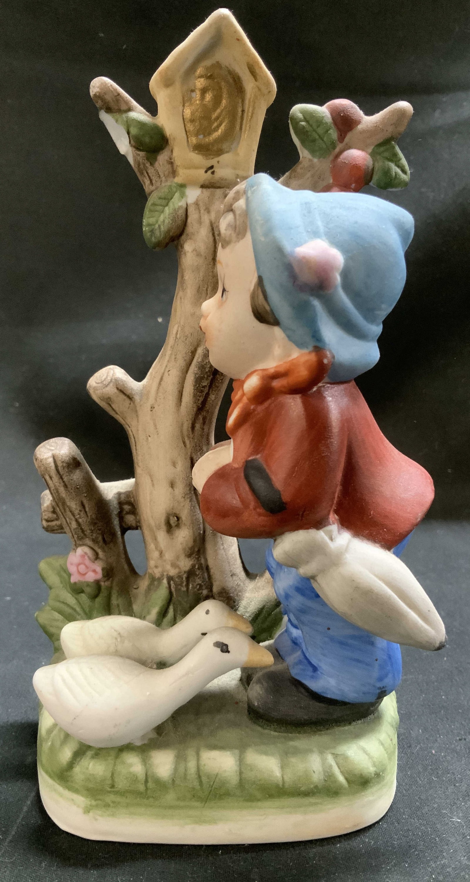 Vtg Royal Crown Boy W Geese Porcelain Figurine: Vintage Royal Crown porcelain figurine depicting a young boy in a red jacket & standing with two geese. Signed & marked on underside. Reads, ROYAL CROWN. Surface wear consistent to age, use & exposure