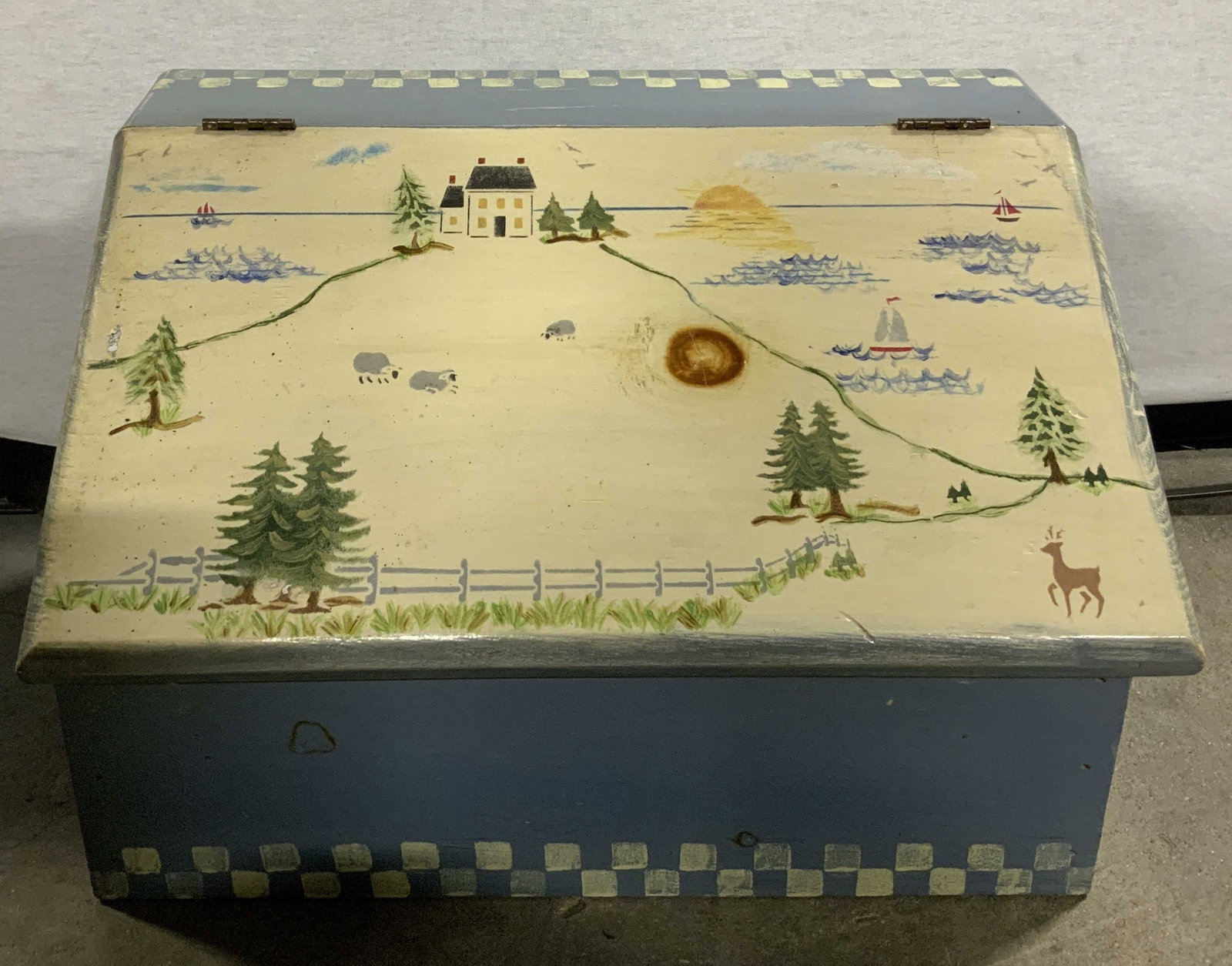Sgnd Vtg Hand Painted Wooden Box: Vintage wooden box features a hinged lid with hand painted house, boats & tree motifs. Checkered pattern on top & bottom. Signed & marked on underside. Partial readings, Dog. Rest of lettering is not