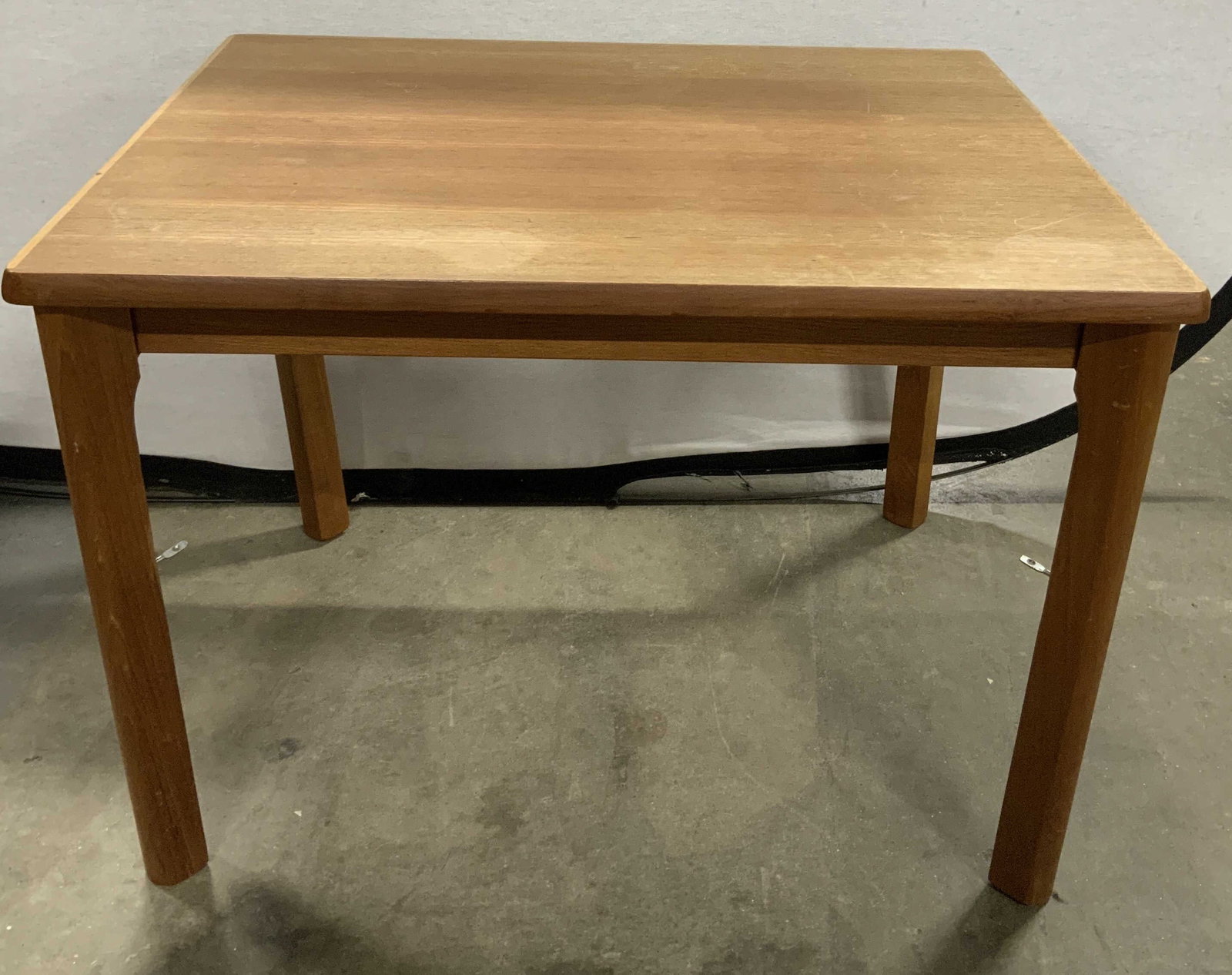 Mobelfabrikken Toften Wd Accent Table DENMARK: Wooden accent table features a rectangular top. Stands on 4 legs. Brown toned. Signed & marked on underside. Reads, MADE IN DENMARK BY MOBELFABRIKKEN TOFTEN. Surface wear consistent to age, use & expo