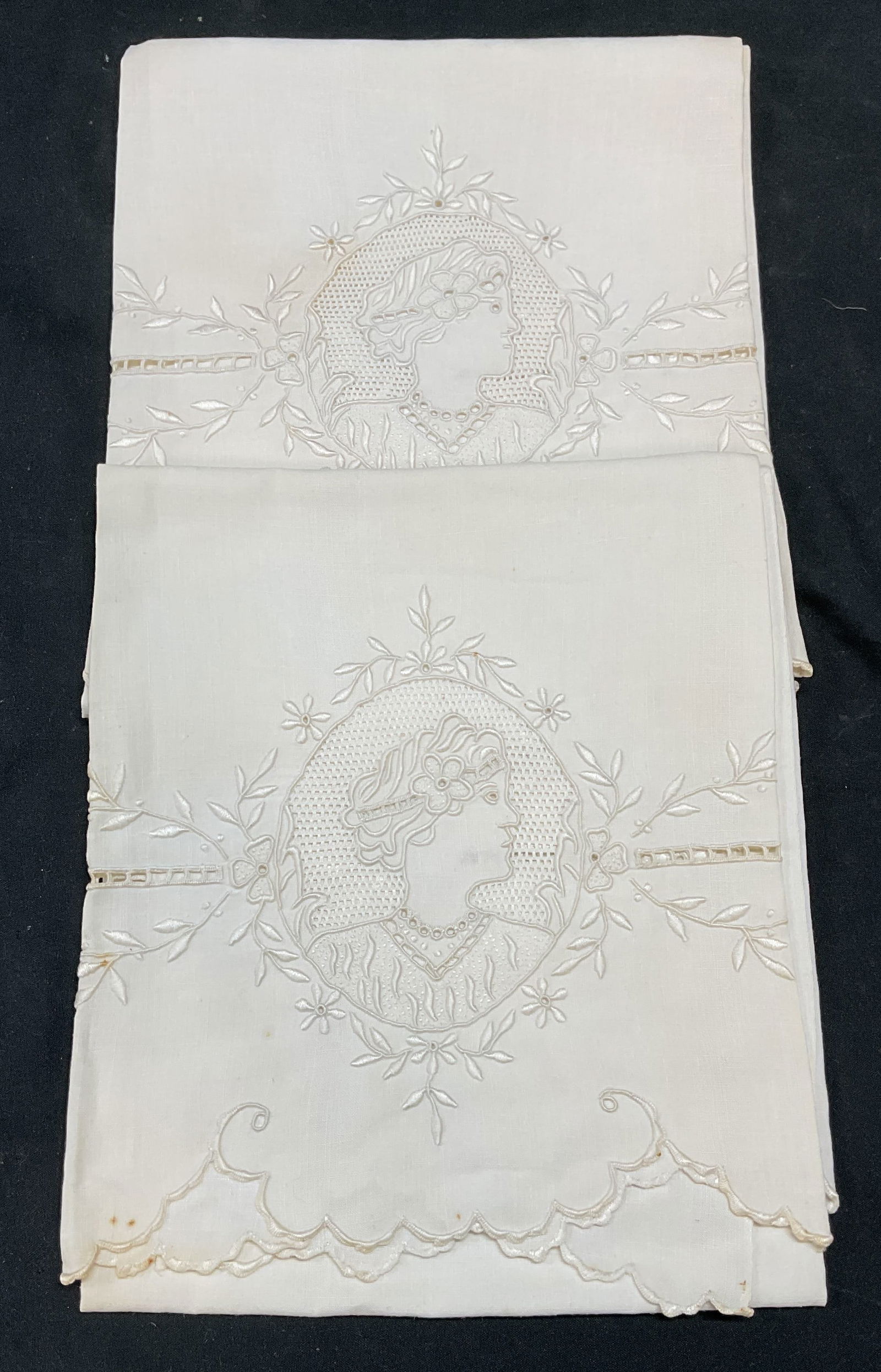 Pair Vintage White Embroidered Woman Tea Towels: Pair of vintage white cotton tea towels with embroidered head of a woman design. Measure approx 33 x 21 inches. Discoloration and holes. White tea towel, woman tea towels, figural tea towel, vintage t