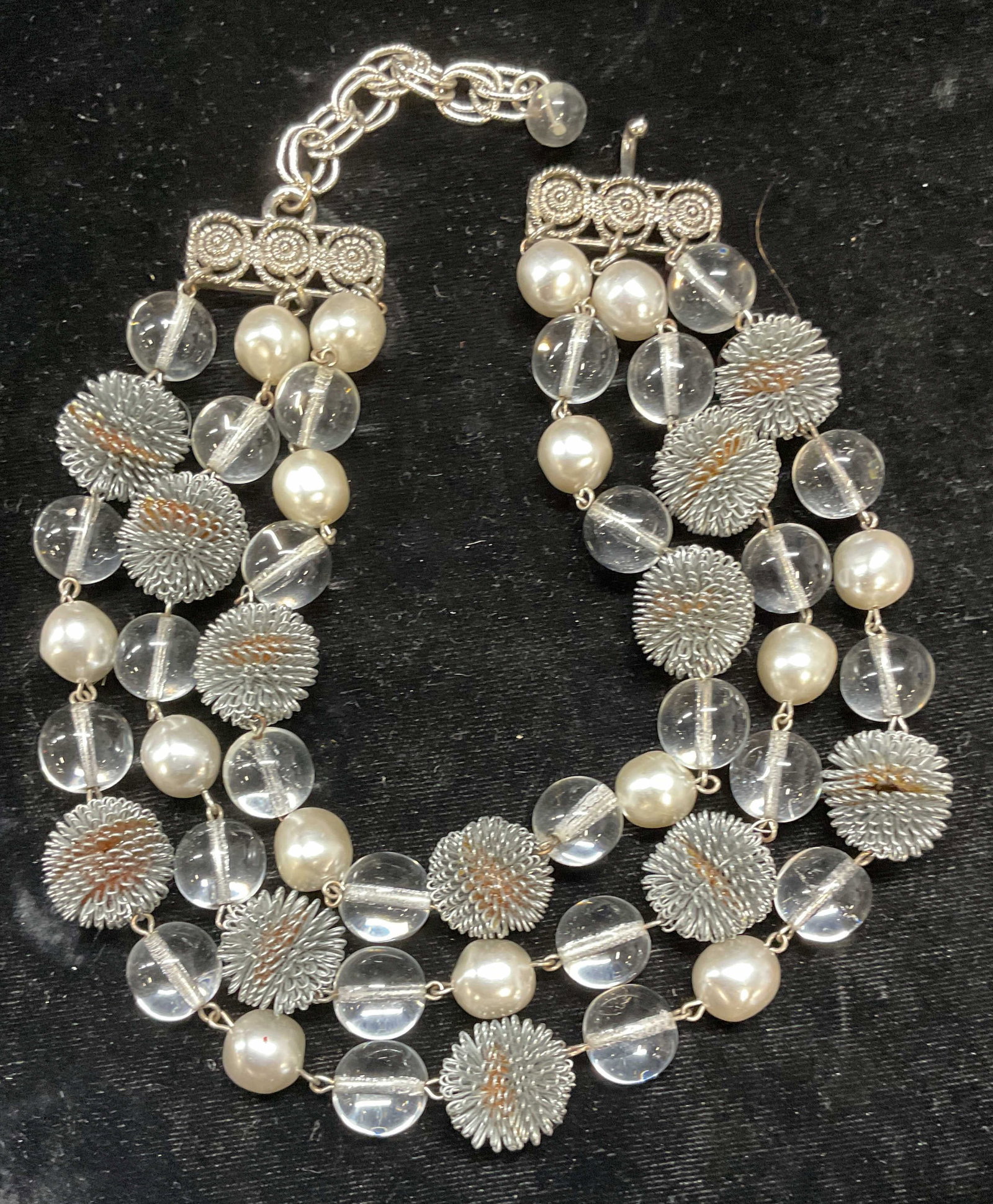 Vtg Iris Apfel Silver Tn Faux Pearl Necklace: Vintage necklace acquired from the Estate of Iris Apfel (American, 1921-2024). Three strand chunky beaded modernist style necklace with silver tone wire beads, clear glass, and faux pearls. Drop lengt