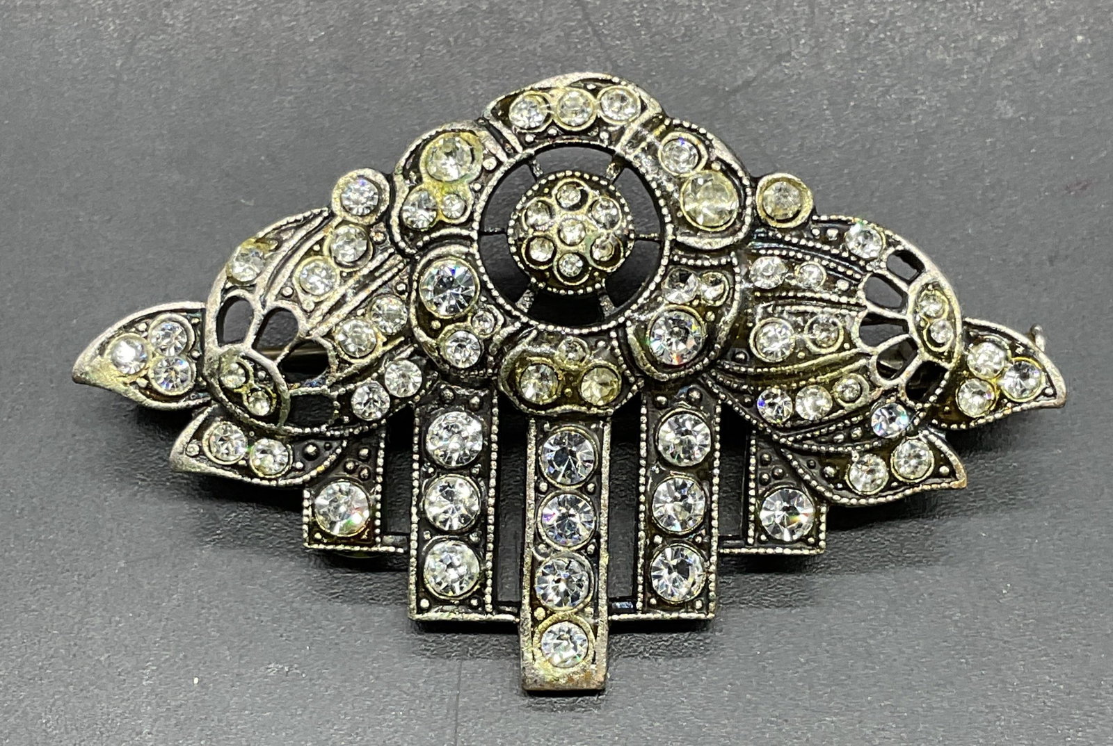 Vintage Silver Tone Crystal Flower Brooch: Vintage art deco style silver tone crystal flower motif brooch. Measures approx 1.75 x 1 inches. Some scratching. Jewelry, estate jewelry, costume jewelry, cocktail jewelry, accessories, fashion acces