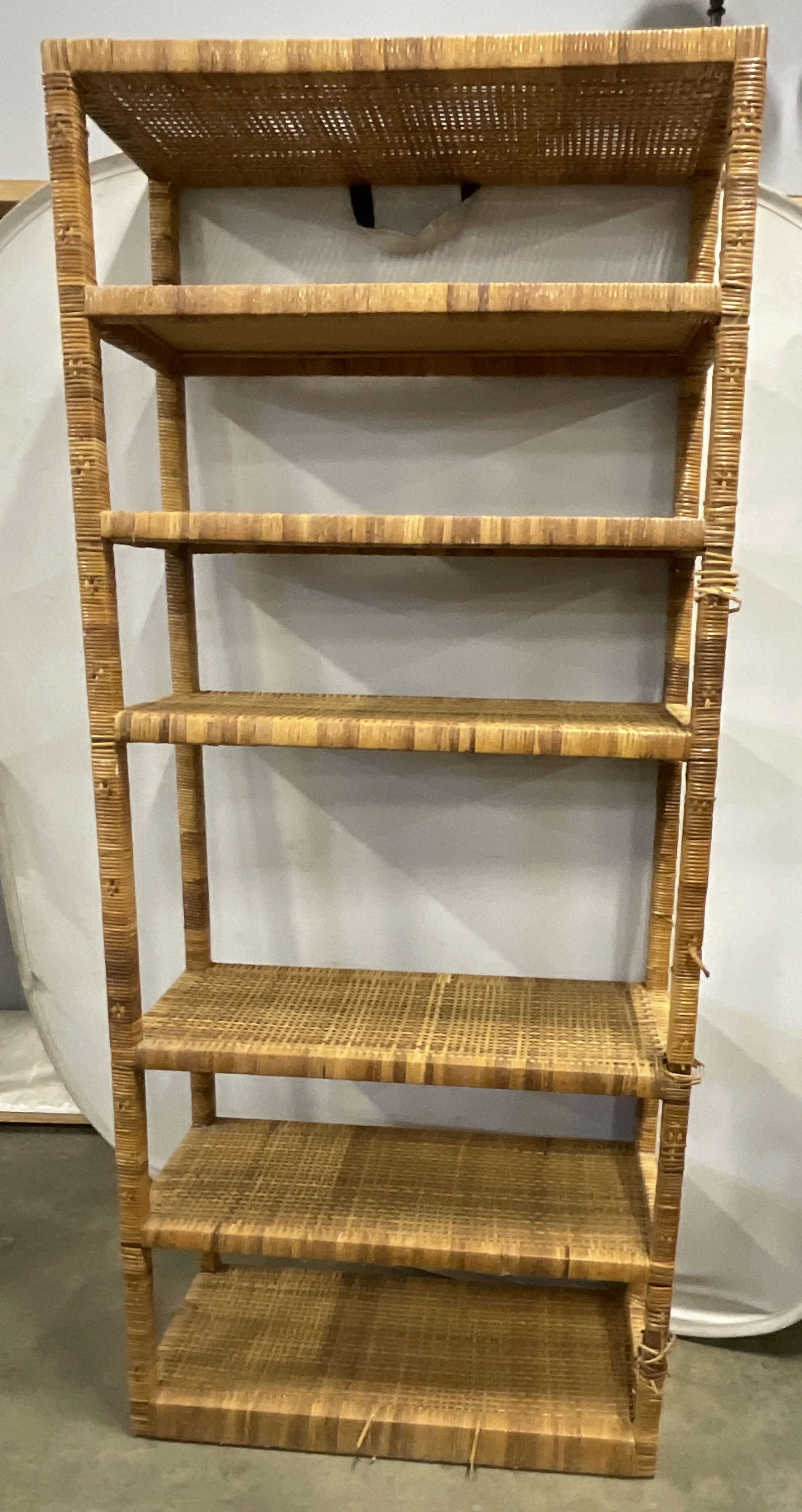 Tall 7 Tier Wicker Shelf 84in: Tall 7 Tier Wicker Shelf in various shades of brown. Some loose pieces. Measures app 84in H x 37in L x 15in W. display shelf, curio shelf, knickknack shelf, living room furniture, home decor, home acc