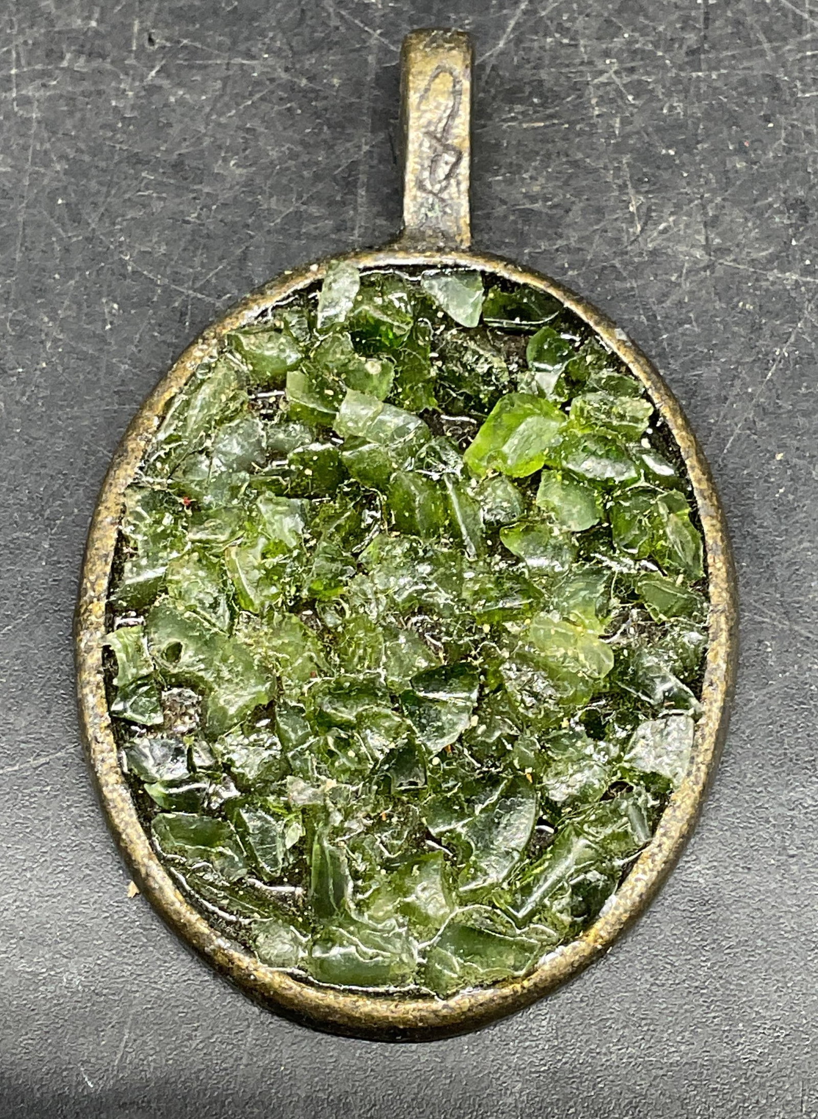 Vintage Silver Tone Green Glass Pendant: Vintage silver tone pendant with green faux stone glass. Measures approx. 1.5 x 1.25 inches. Some scratching. Jewelry, estate jewelry, costume jewelry, cocktail jewelry, fashion jewelry, accessories,