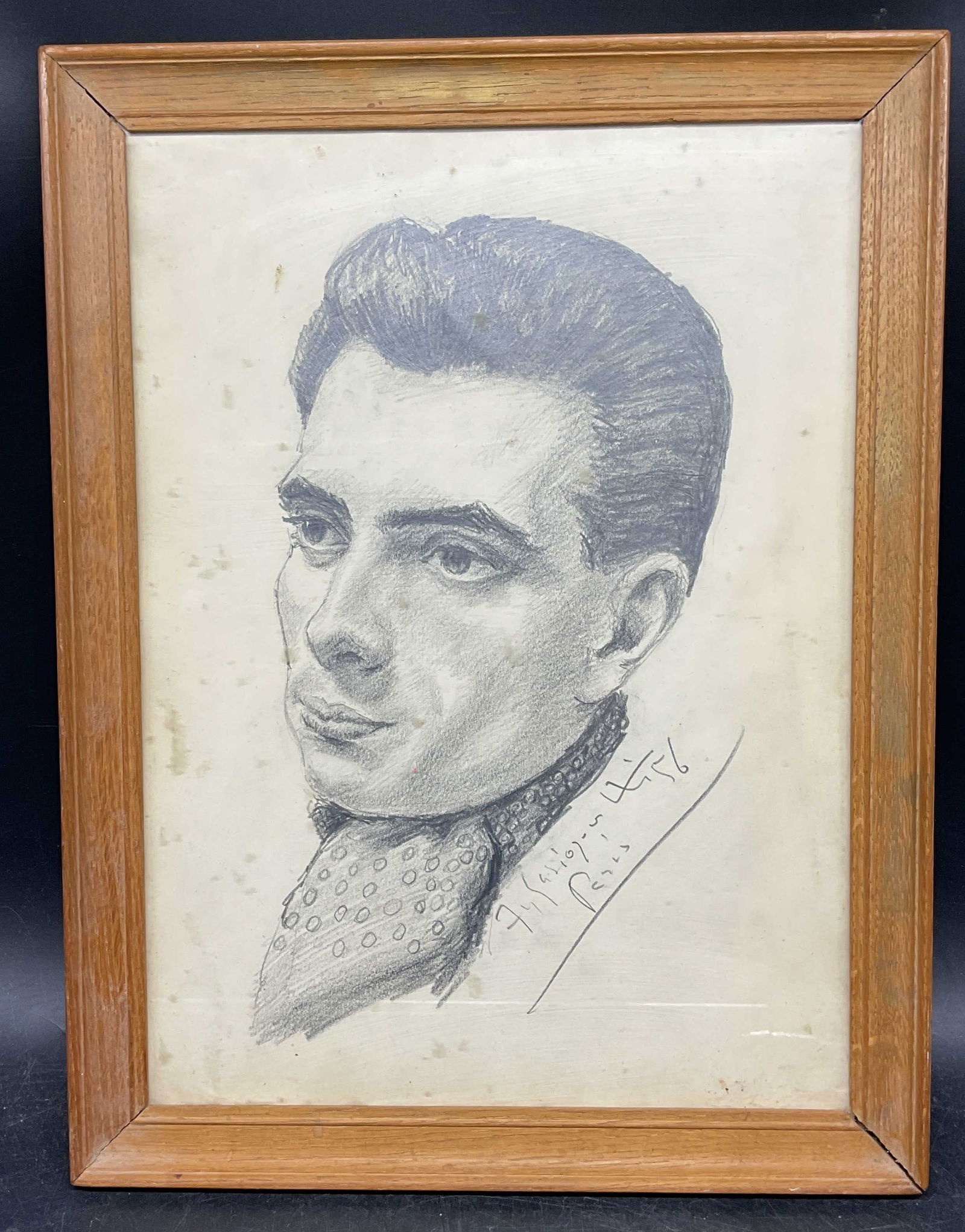 Framed Signed Portrait of a Man Drawing, Paris: Framed portrait drawing on paper. Signed illegibly, dated 1956, Paris. Portrait of a man. Wood frame. Not examined out of frame. Frame measures approx. 14 x 10.75 inches. Some wear including foxing. A