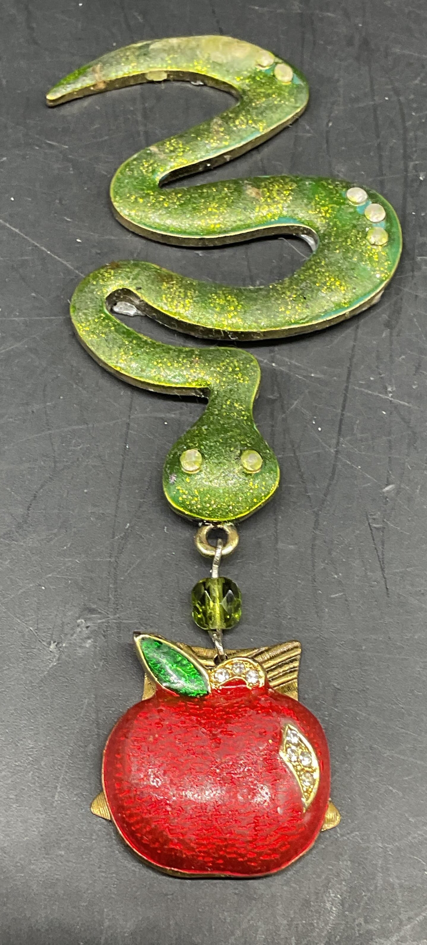 Snake & Apple Enamel Crystal Pendant: Gold tone enameled snake and apple motif pendant with crystal decoration. Measures approx. 3.75 x 1.25 inches. Some scratching. Jewelry, estate jewelry, costume jewelry, cocktail jewelry, fashion jewe