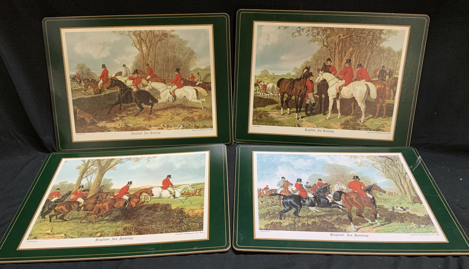 Set 4 English Fox Hunting Scenic Placemats: Lot includes, set 4 English Fox Hunting cork-backed placemat featuring artwork by J.F. Herring. Features figures riding horses. Surface wear consistent to age, use & exposure. Measurements: length 15.
