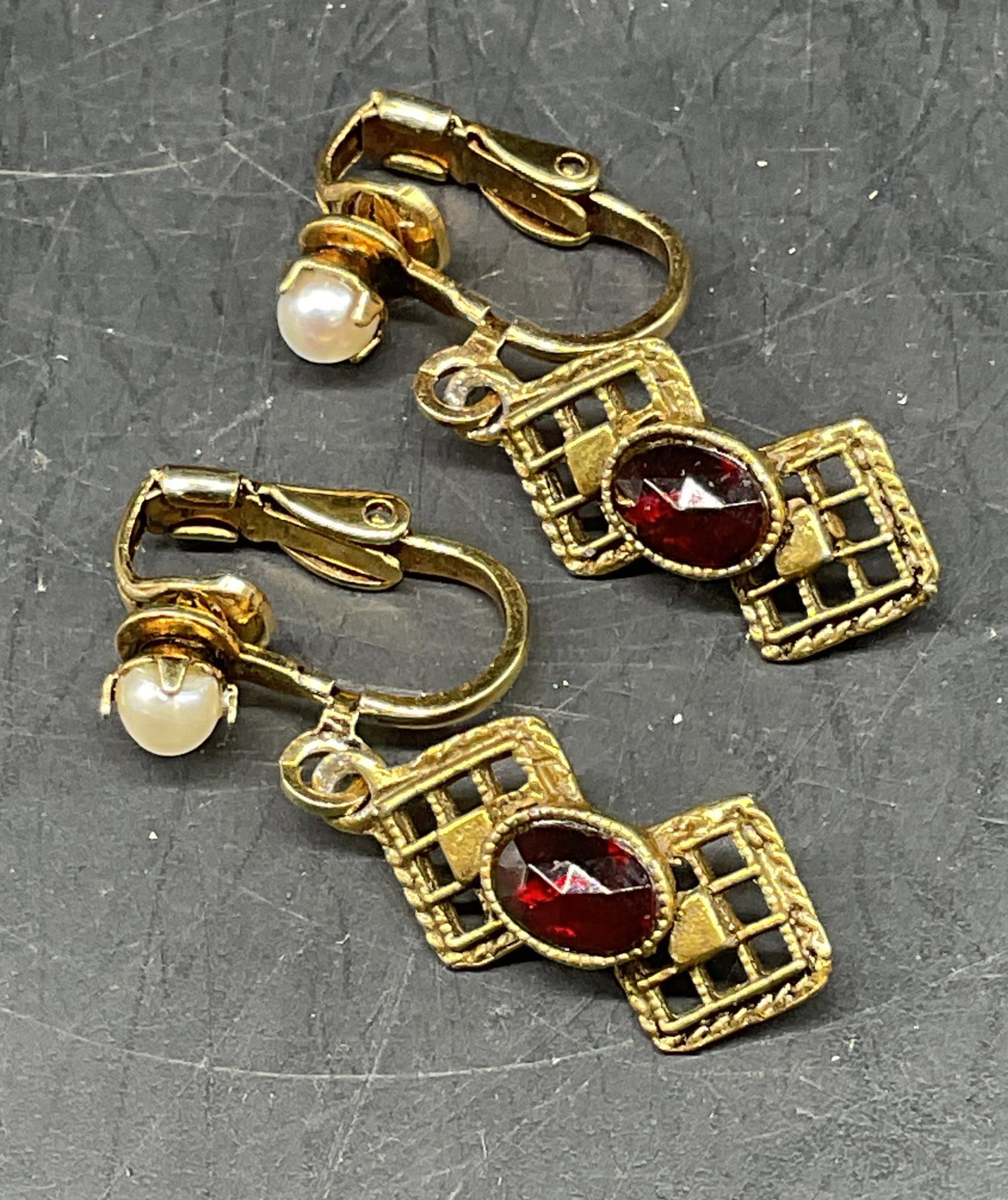 Vintage Gold Tone Faux Pearl Crystal Earrings: Vintage gold tone faux pearl and red crystal earrings. Measures approx. 1.25 inches long. Some scratching. Jewelry, estate jewelry, costume jewelry, cocktail jewelry, fashion jewelry, accessories, fas