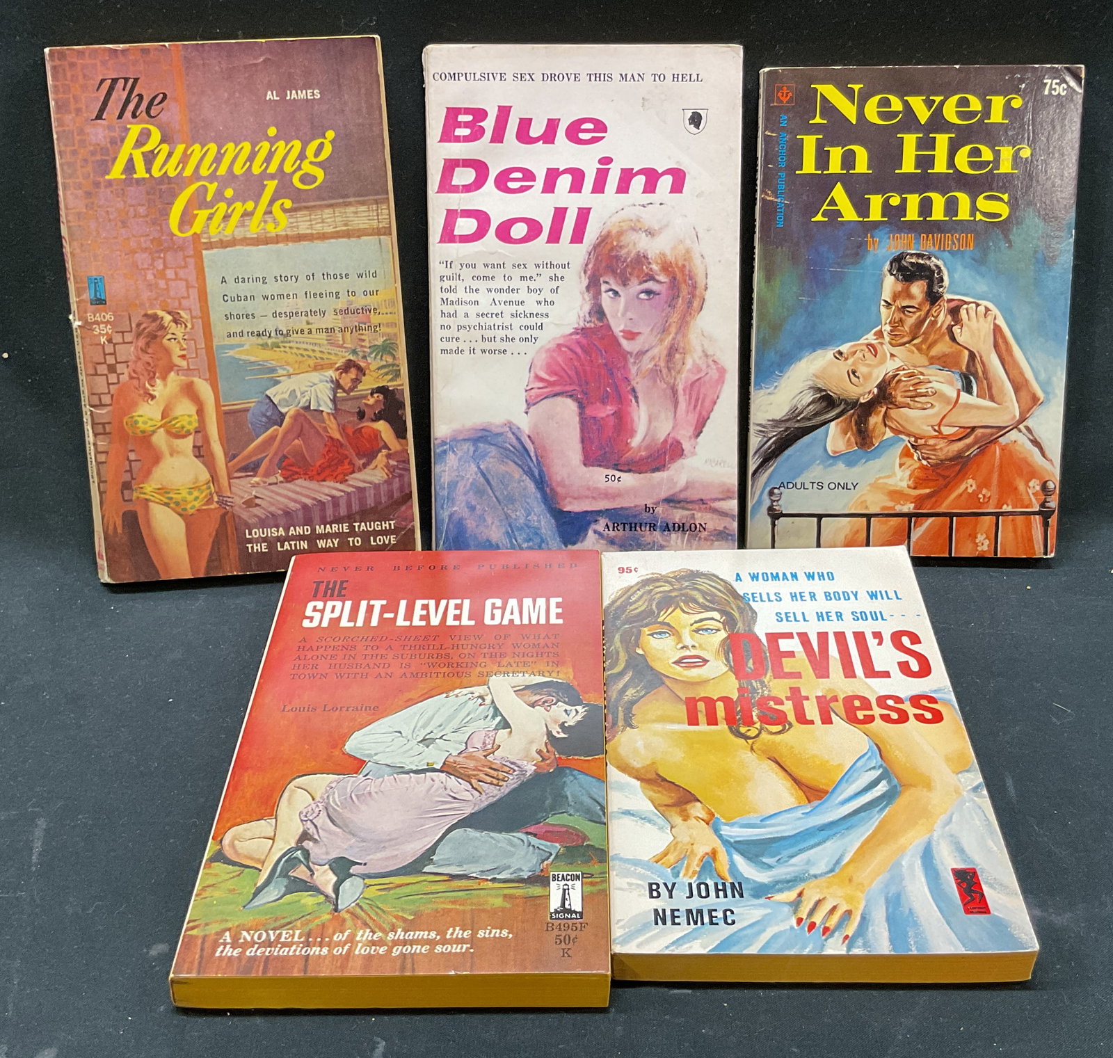 Lot 5 Pulp Fiction Erotica Bks 1960s Davidson+: Lot of 5 books. Never In Her Arms by John Davidson (1965). Blue Denim Doll by Arthur Adlon (1960). The Running Girls by Al James (1961). The Split Level Game by Louis Lorraine (1962). Devils Mistress
