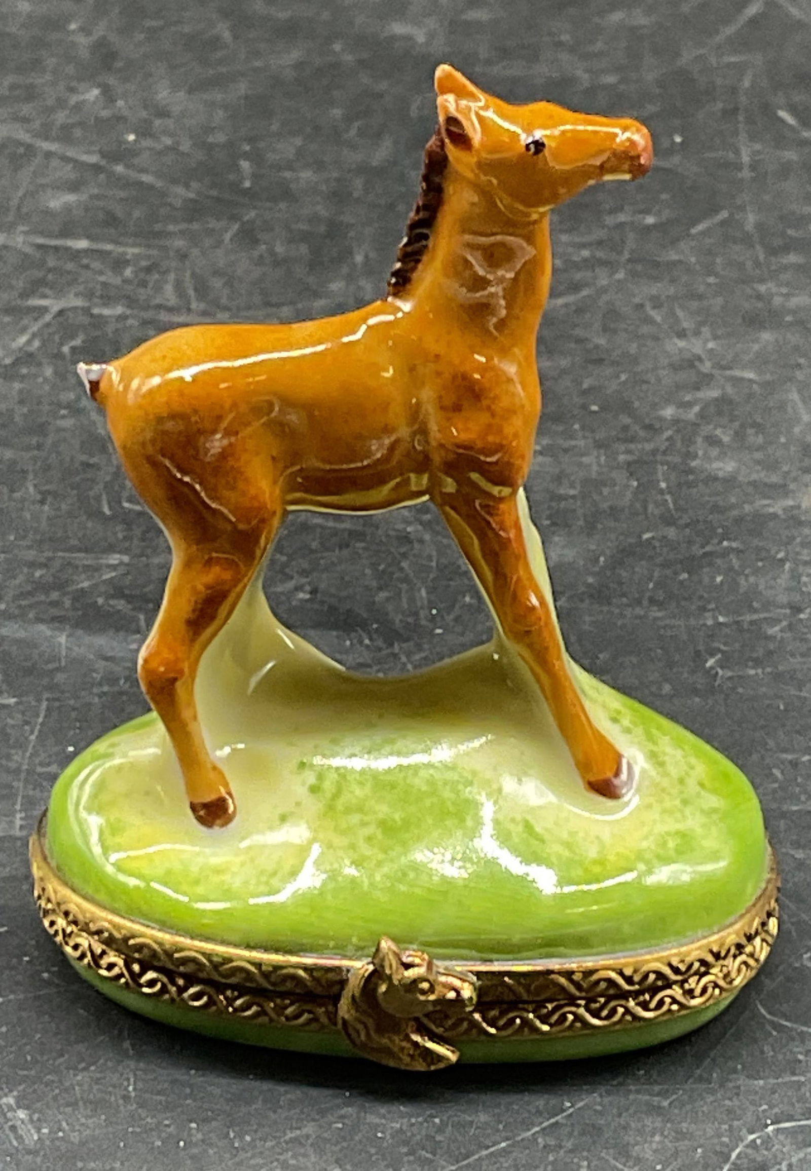 Limoges Porcelain Horse Trinket Box France: Signed Limoges porcelain horse motif trinket box. Signed Eximious Destieux. Made in France. Hand painted. Measures approx. 1.75 x 1.25 x 2.25 inches. Wear including scratching and chip to tail. Limoge