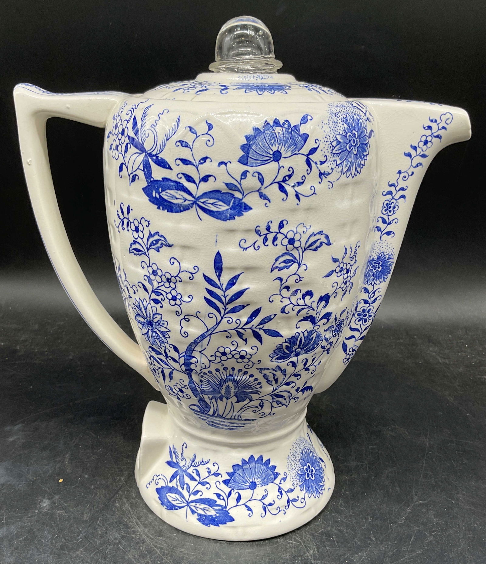 Vintage Porcelain Electric Coffee Percolator: Vintage porcelain electric coffee percolator. Blue and white Transferware with ornate floral design. Measures approx. 9.5 x 9.5 inches. Wear including scratching, crazing, hairlines. As Is, lot includ