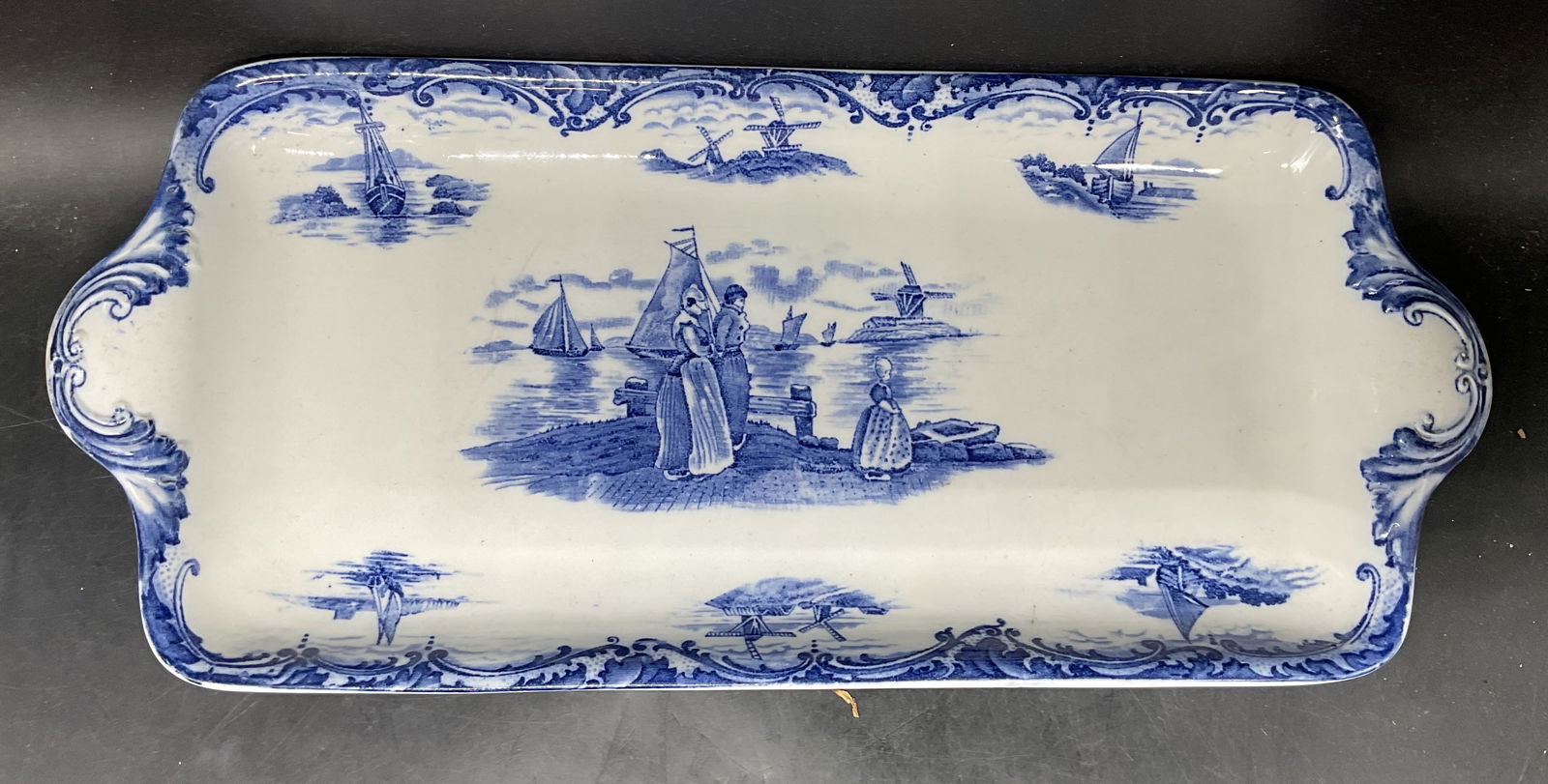 Antique Wedgwood Hague Ceramic Platter: Antique signed Wedgwood & Co ceramic platter. Hate pattern. Figures and boats. Blue and white. Made in England. Measures approx. 17.5 x 7.5 x 1.5 inches. Some scratching. Antiques, collectibles, antiq
