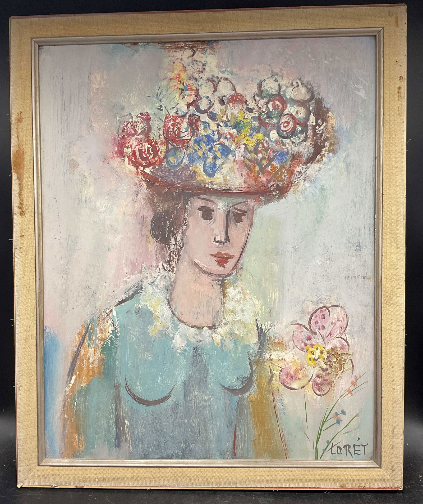 Signed Otto Botto Loret Woman Oil Painting 22in: Framed oil on board painting. Signed Loret (Otto Botto, Swiss/American, 1903-1967) at lower right. Portrait of a woman with colorful hat and flower. White wood frame. Not examined out of frame. Frame