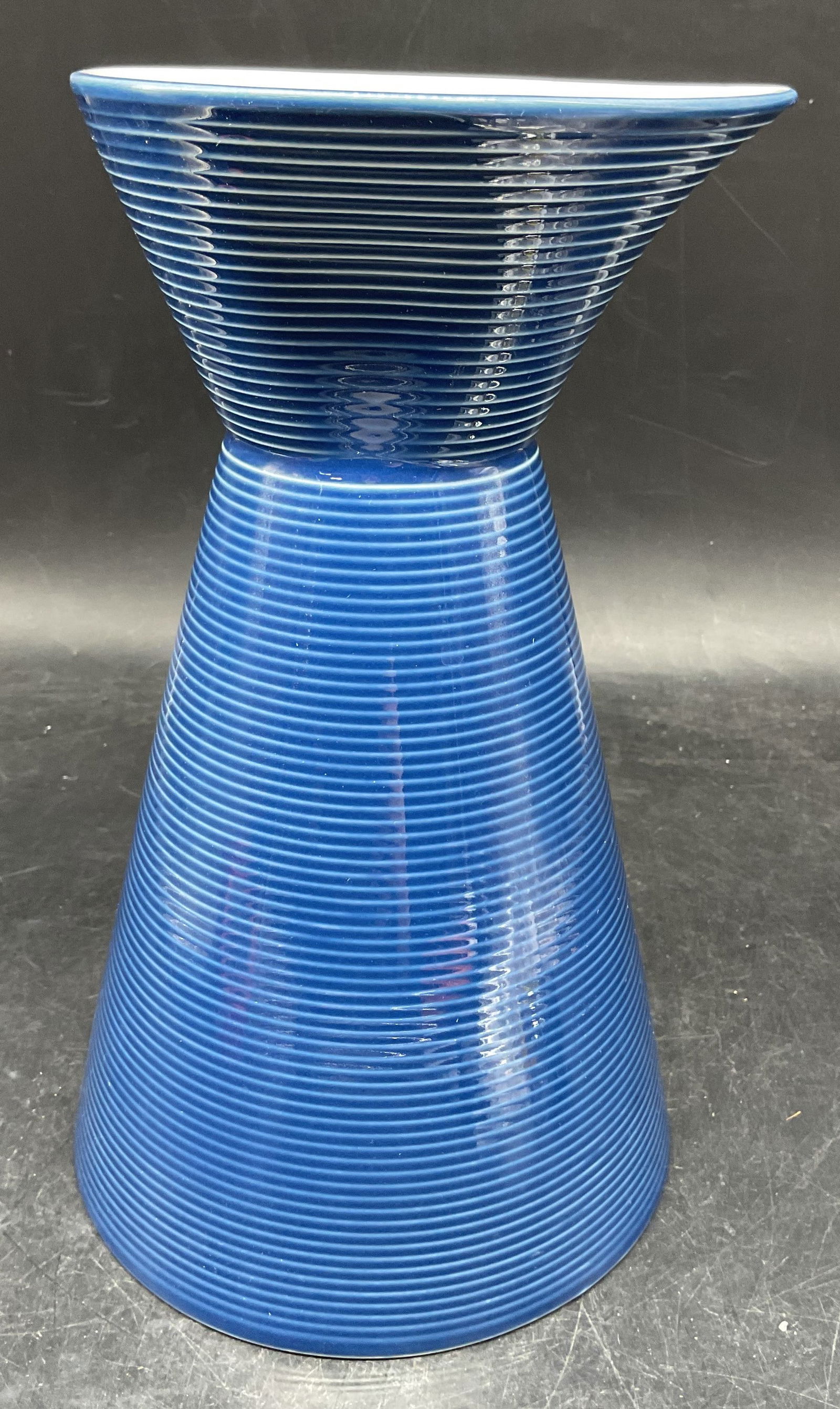 DANSK Topos Ribbed Wave Ceramic Decanter: Signed DANSK Topos ceramic blue ribbed wave decanter pitcher. Measures approx. 5 7/8 x 9.75 inches. Some scratching. DANSK Topos, DANSK decanter, ceramic decanter, blue decanter, tableware, table acce