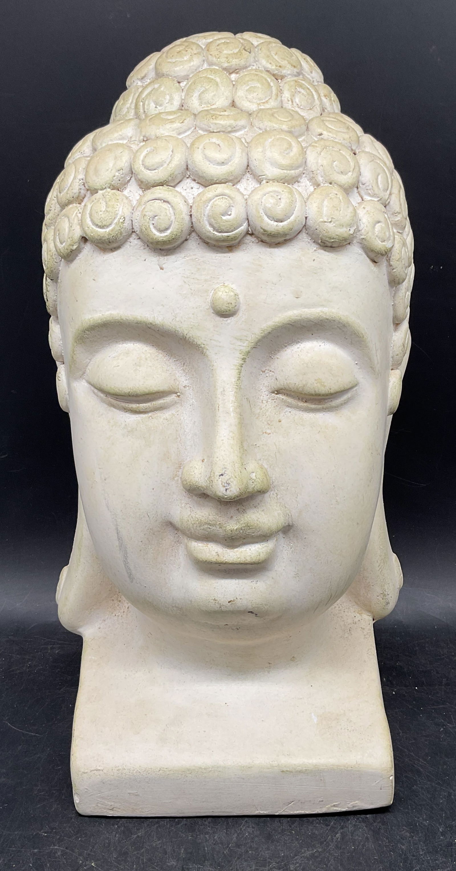 White Ceramic Buddha Head Statue 13 In Tall: White ceramic Buddha head statue. Measures approx. 7 x 6 x 13 inches, some scratching and marks. Buddha, Buddha head, Buddha statue, decorative arts, home decor, home accessories, table decor, table a