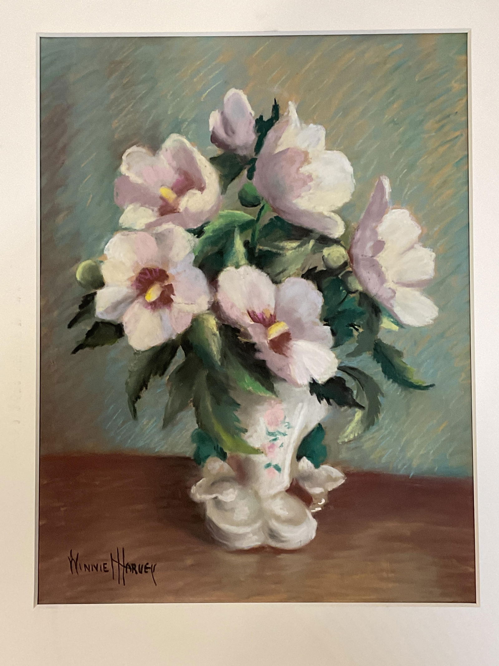 Signed Winnie Harvey Still Life Flowers Pastel: Matted pastel drawing on paper. Signed lower left, Winnie Harvey (American, 1891-1964). Still life with a vase of flowers. Not examined out of mat. Paper measures approx. 19 x 14 inches. Wear includin