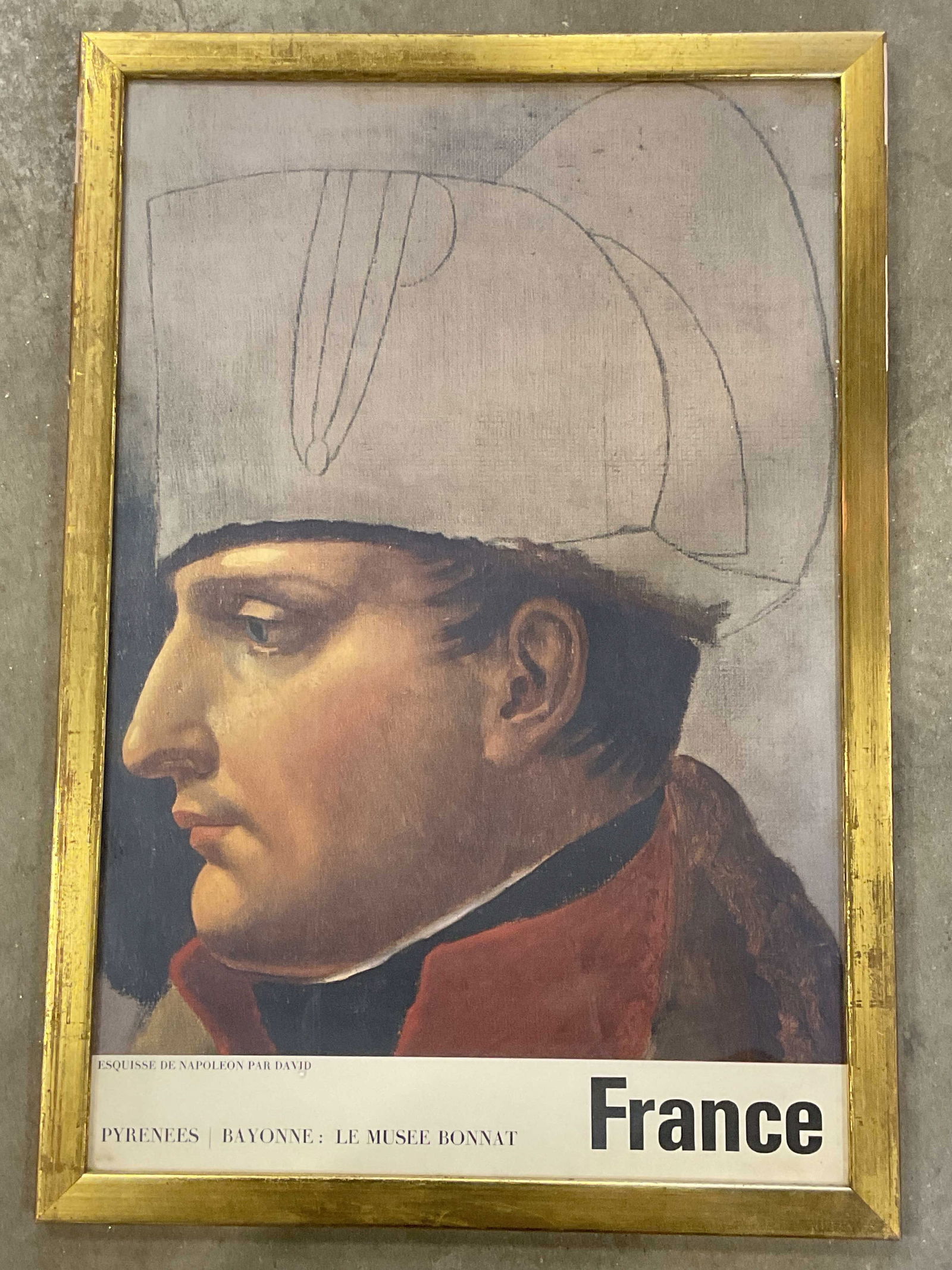 Framed France Bayonne Napoleon Litho Poster 25in: Framed vintage lithograph poster. Features unfinished oil portrait of Napoleon by Jacques Louis David. Pyrenees, Bayonne - Le Musee Bonnat. Gilt wood frame. Not examined out of frame. Frame measures a