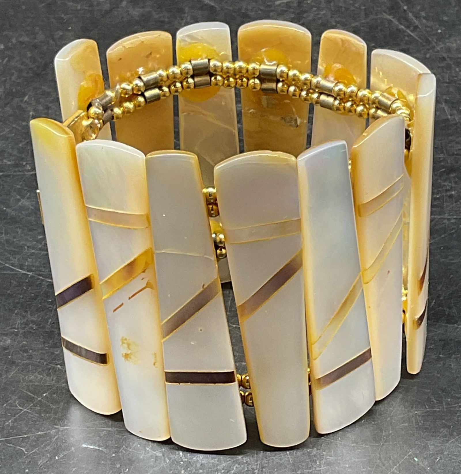 Vtg William DeLillo Mother of Pearl Bracelet: Vintage signed William DeLillo bracelet with mother of pearl panels and geometric design. Measures approx. 6.5 inches long, 2.25 inches wide. Some scratching. Jewelry, estate jewelry, fine jewelry, co