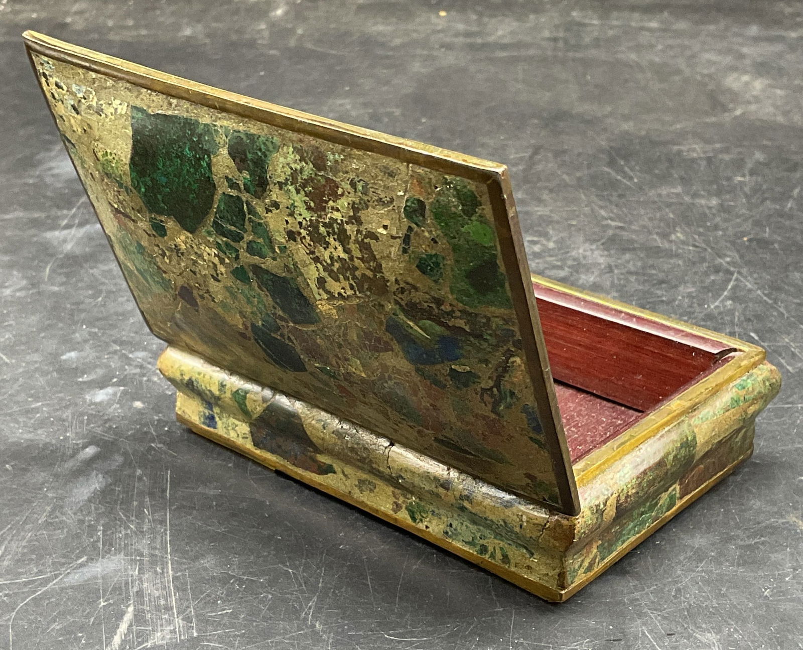 Vtg Brass Green Stone Jewelry Box, Mexico: Vintage brass and green stone mosaic jewelry box with wood interior. Made in Mexico. Style of Los Castillo, no signature or markings. Measures approx. 4.25 x 3 x 1.5 inches. Wear including patina