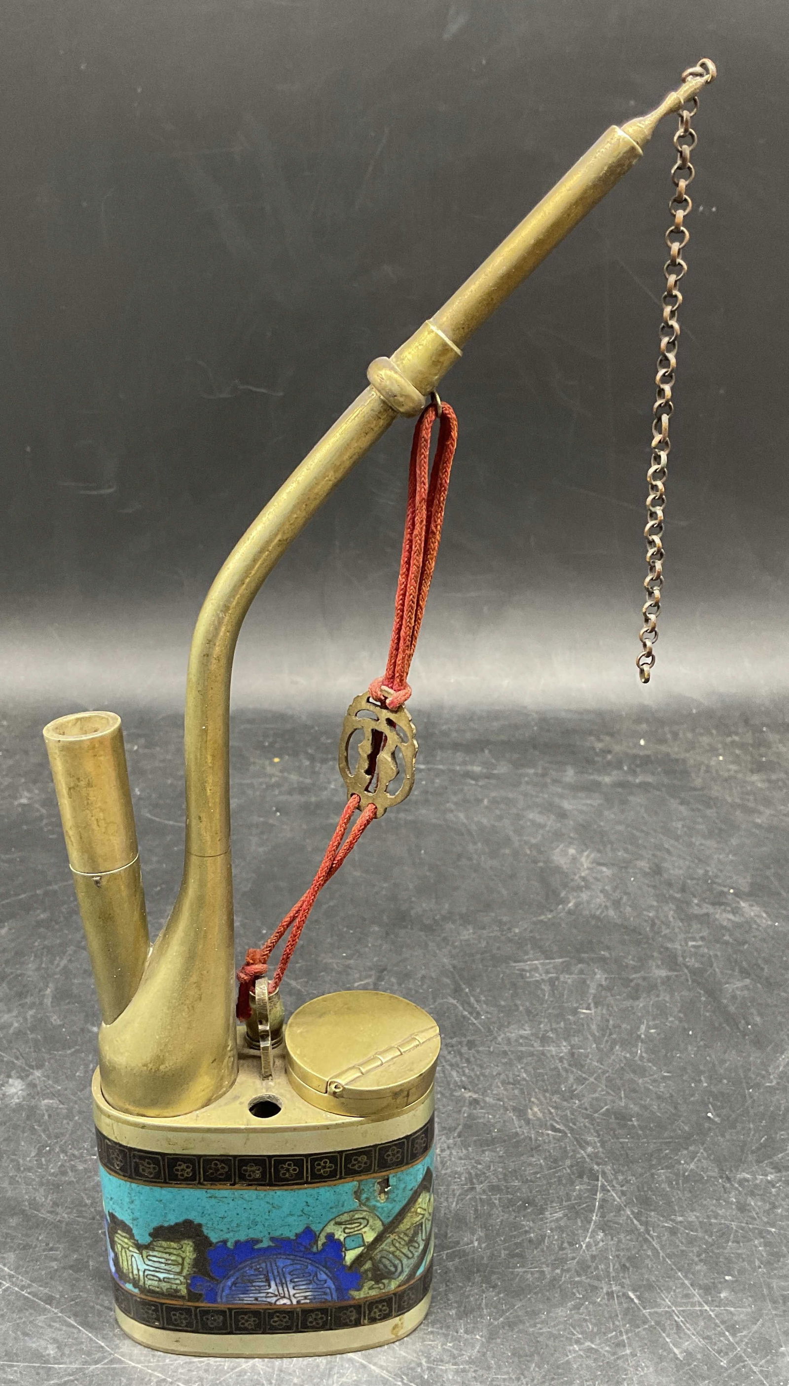 Chinese Brass Cloisonne Water Opium Pipe: Antique Chinese brass water/opium/tobacco pipe. Cloisonne enamel decoration in blue with traditional style design. Measures approx. 3 x 1.25 x 10 inches. Wear including patina and some loss to