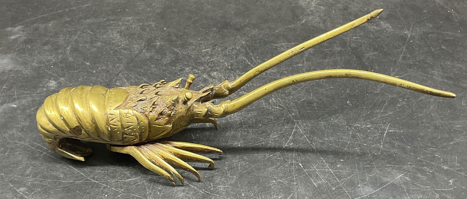 Vintage Japanese Brass Lobster Figurine: Vintage Japanese style brass lobster figurine. Measures approx. 8.5 x 3.25 x 2.5 inches. Wear including patina and scratching. Lobster figurine, lobster, brass lobster, collectibles, home decor,