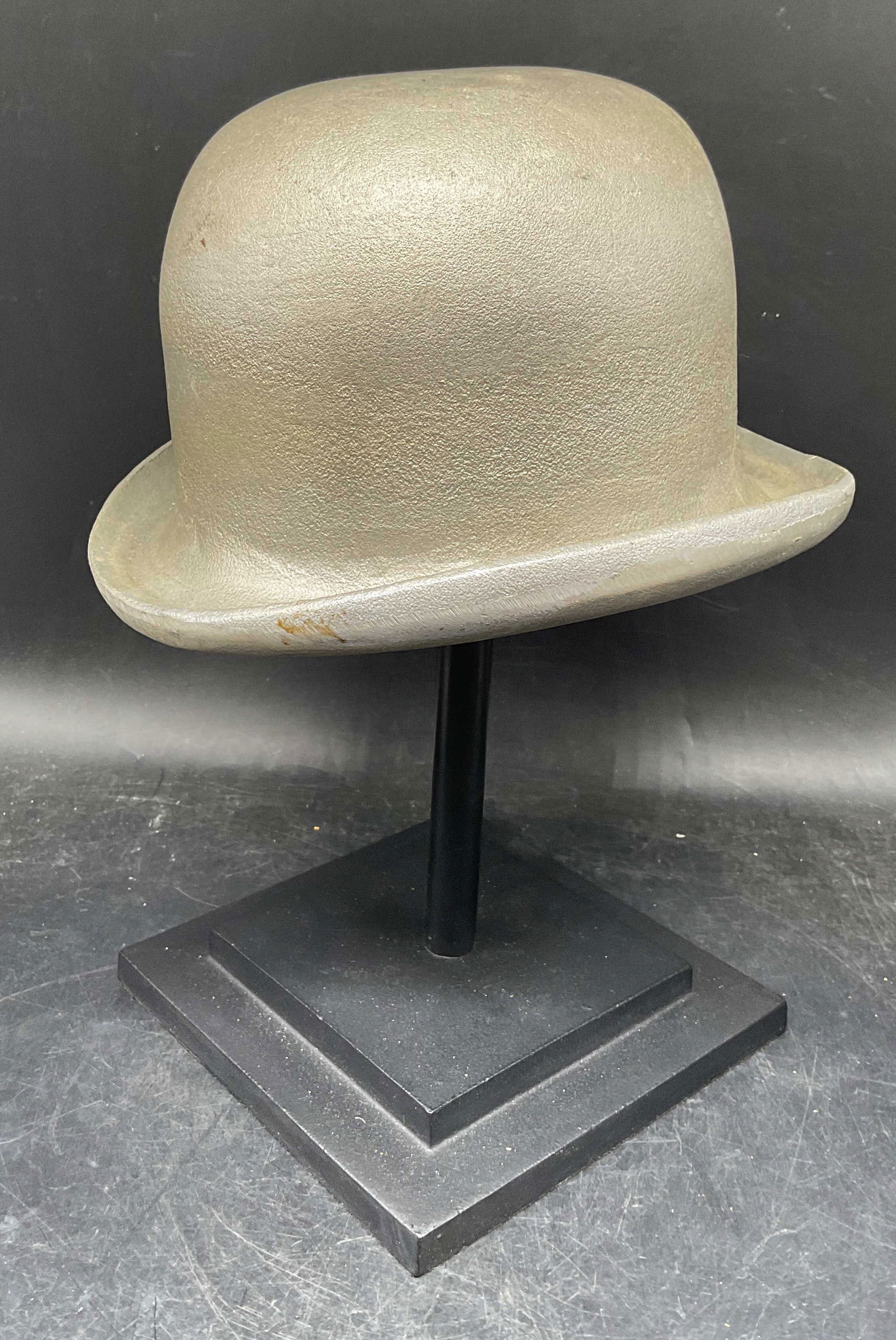 Restoration Hardware Metal Bowler Hat on Stand: Restoration Hardware decorative bowler hat on stand. Silver tone cast metal sculpture. Measures approx. 9.5 x 8.75 x 13 inches. Some wear including scratching. Restoration hardware sculpture, hat