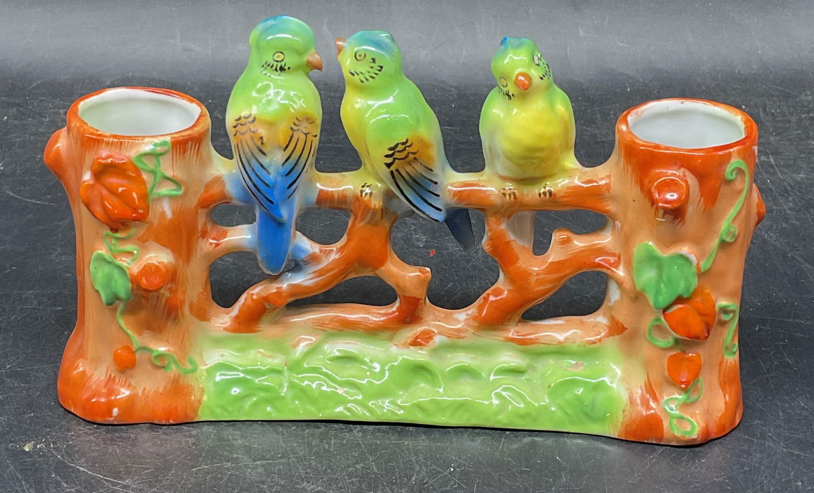 Vtg Sgn Ceramic Double Bud Bird Vase, Japan: Vintage signed ceramic double bud vase. Perched bird motif. Hand painted orange and green. Signed with makers mark, made in Japan. Measures approx. 7.75 x 2 x 4.25 inches. Some scratching and loss to