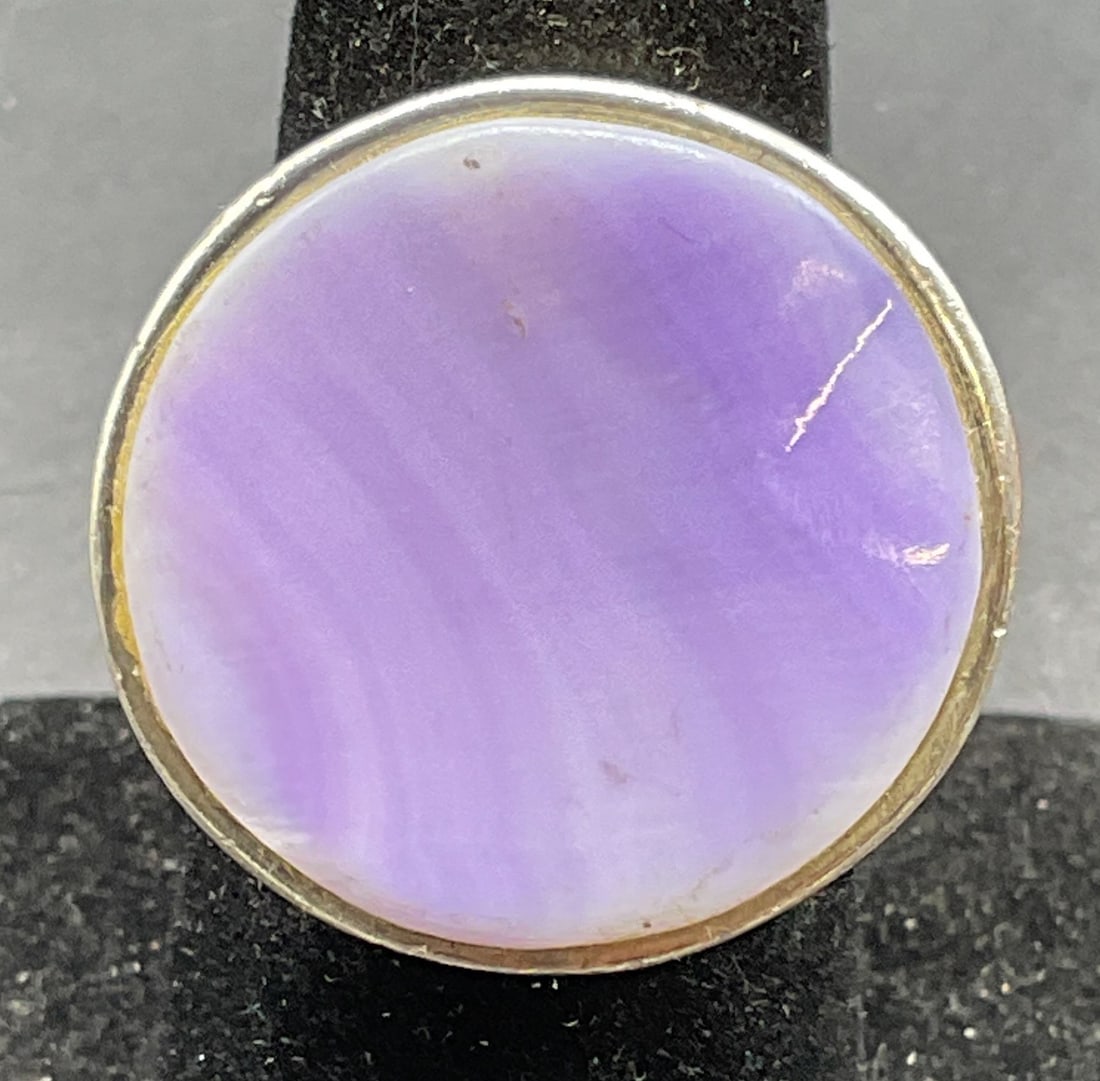 PS Sterling Silver Purple Mother of Pearl Ring: Signed PS sterling silver ring with purple mother of pearl setting. Ring size 6.75. Total weight 18.1 grams. Marked sterling. Some scratching. Jewelry, estate jewelry, fine jewelry, cocktail jewelry,