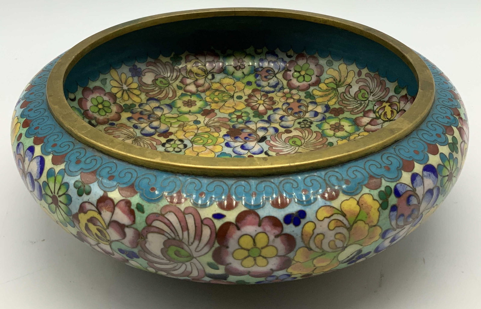 Vtg Asian Cloisonne Enamel Floral Bowl: Vintage Asian cloisonne enamel bowl features vibrant floral motifs on exterior & interior. Gilt accents. No visible signature or markings. Surface wear consistent to age, use & exposure. Measurements: