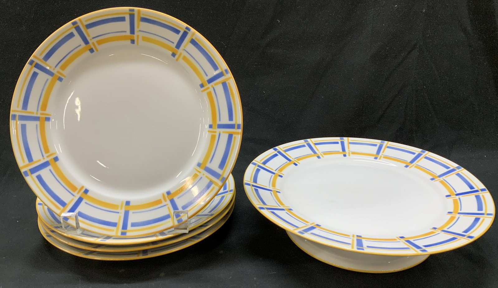 Set 5 Vtg Limoges Unique Porc Tableware FRANCE: Lot includes, 4 plates & 1 footed cake stand. Pieces are porcelain & feature a distinctive blue with yellow geometric pattern. Signed & marked. Reads, LIMOGES FRANCE. UNIQUE. Surface wear consistent t