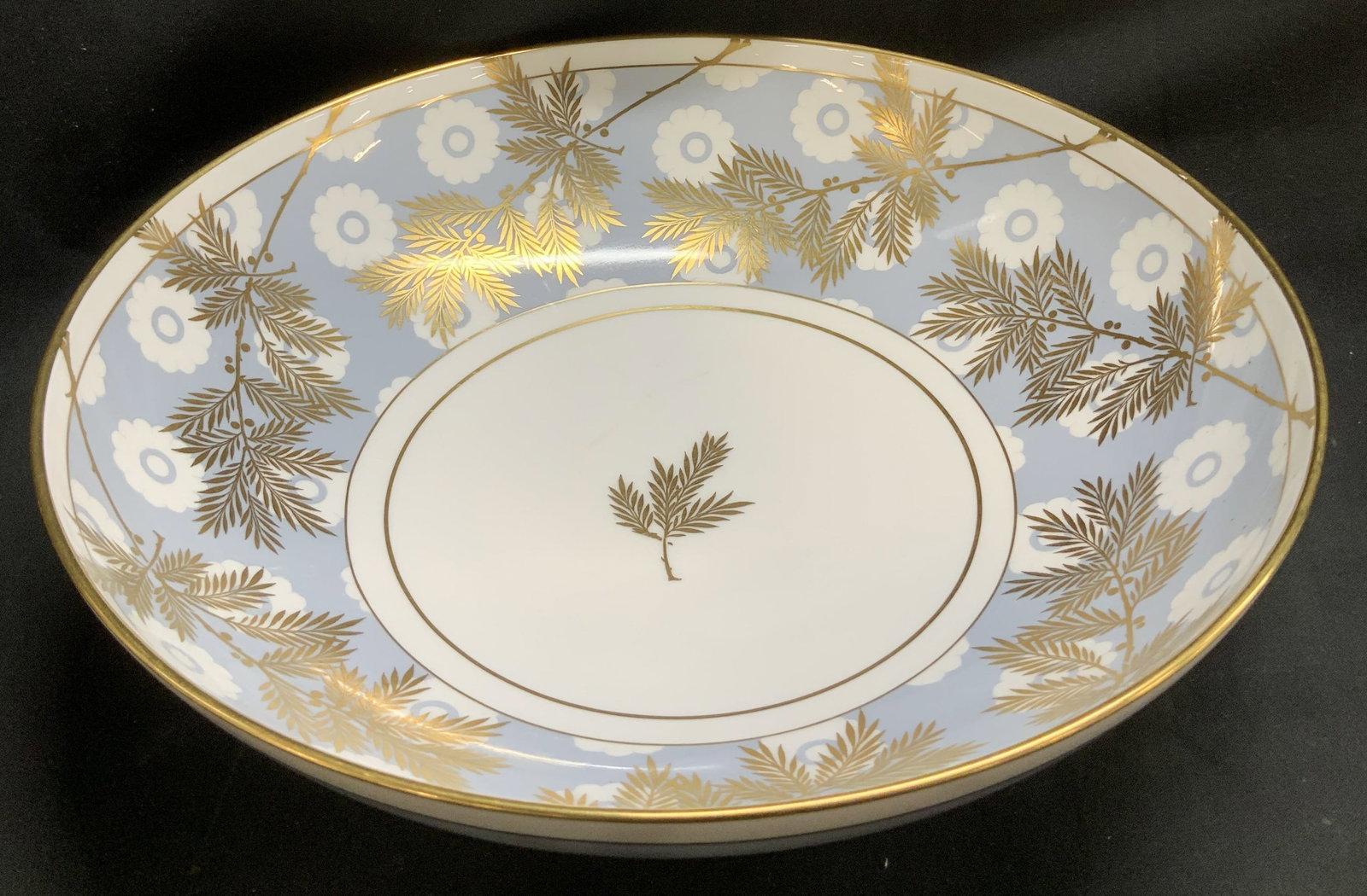 Vtg Founded Minton John Wadsworth Bowl ENGLAND: Vintage bone china bowl features gilt leaf/branch accents. Blue & white floral background. Signed & marked on underside. Reads, FOUNDED MINTON 1793. BONE CHINA. MADE IN ENGLAND. DESIGNED BY JOHN WADSW