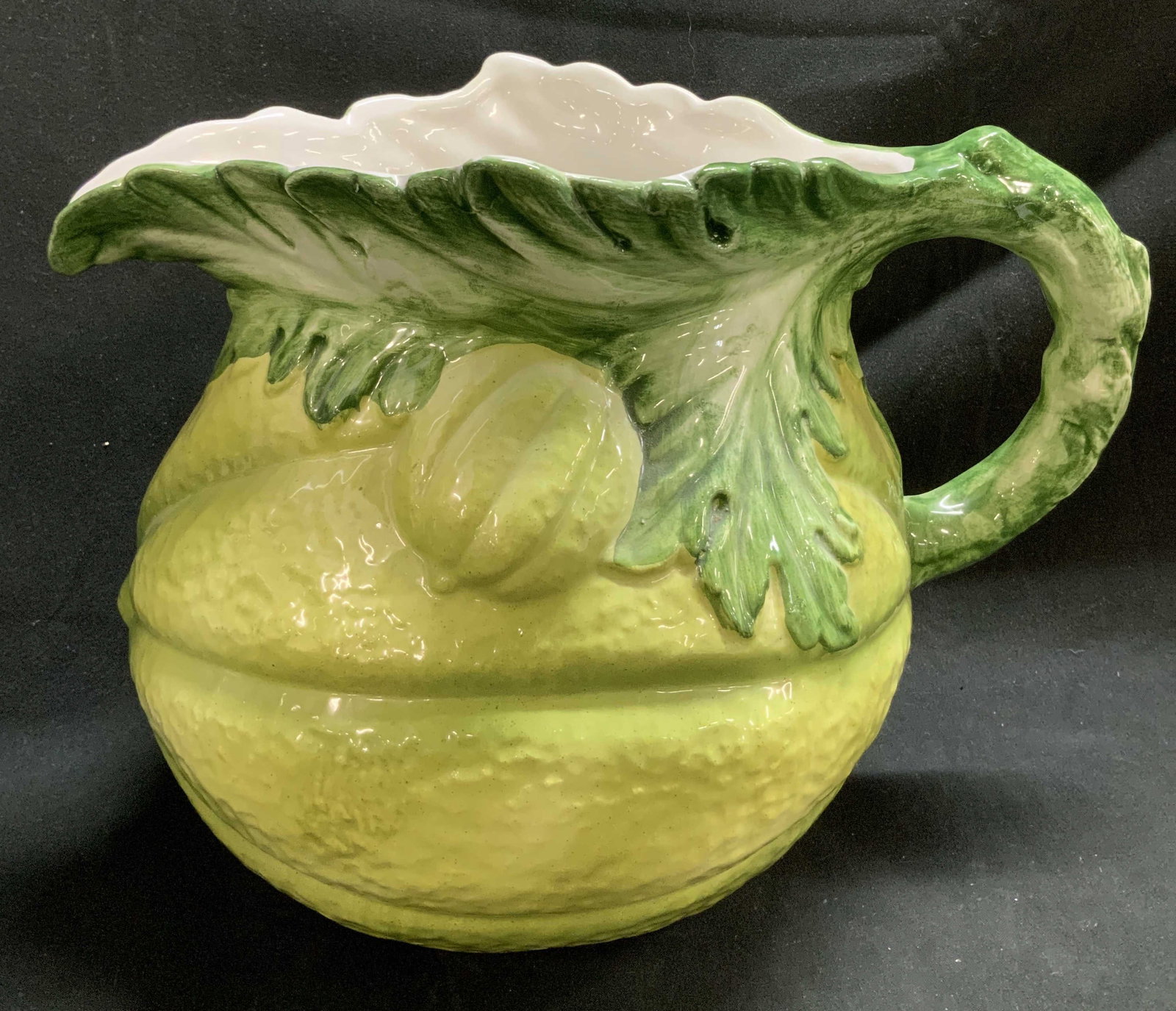Vtg Green Lemon Ceramic Pitcher ITALY: Vintage pitcher shaped like a lemon with a green leaf shaped spout. Glossy finish. Signed & marked on underside. Reads, MADE IN ITALY. 385/13. Surface wear consistent to age, use & exposure.