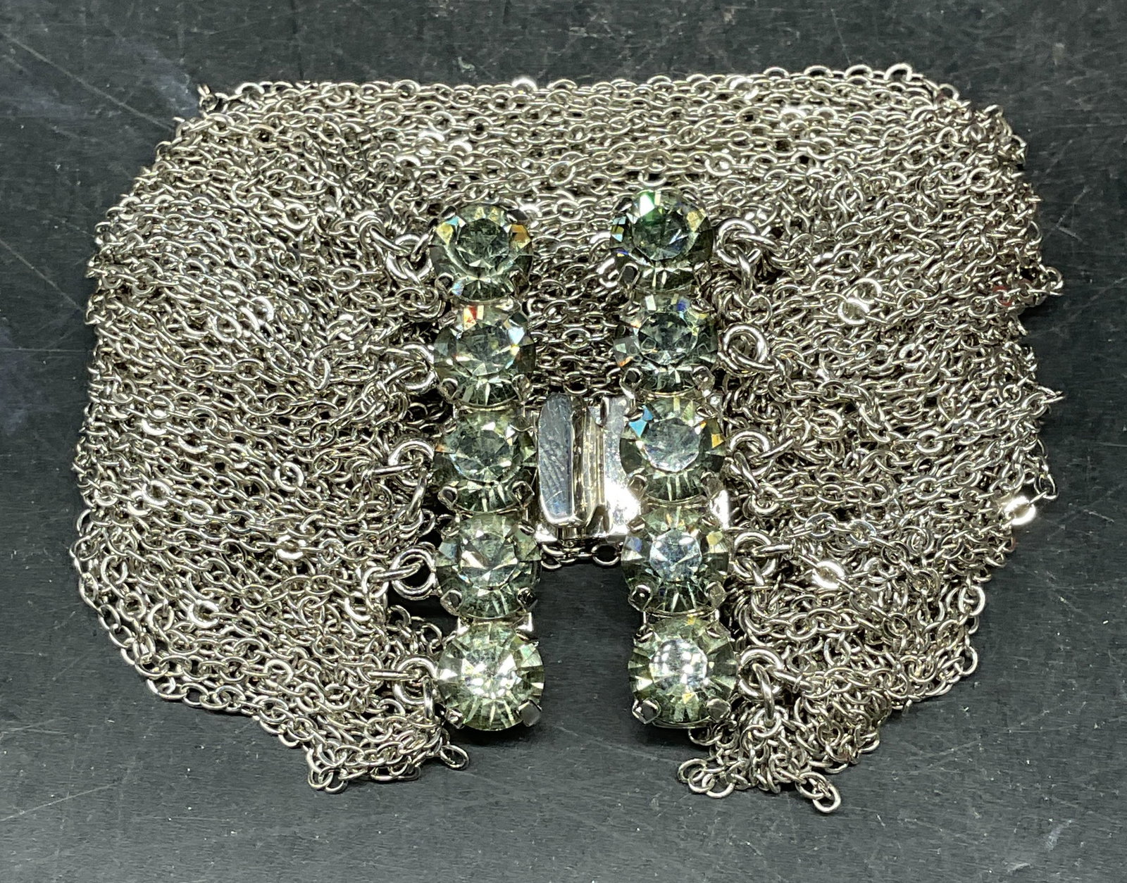 Lee Angel Silver Tone Crystal Bracelet: Signed Lee Angel silver tone multi chain stake net bracelet with crystal decorated clasp. Measures approx. 7.25 inches long. Some scratching. Jewelry, estate jewelry, costume jewelry, cocktail jewelry