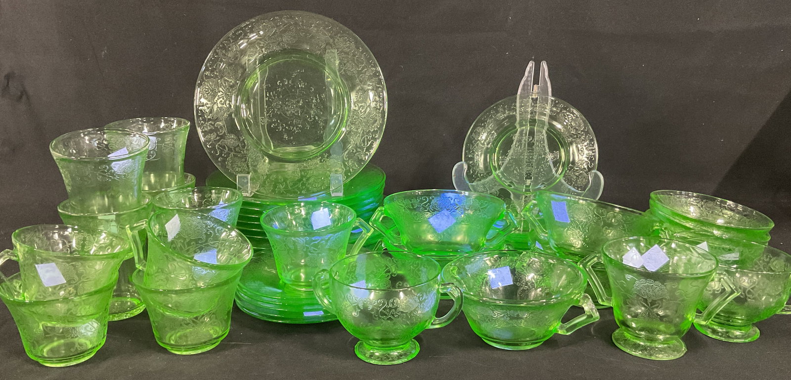 Set 44 Antq Hazel Atlas Uranium Glass Tableware: 44 piece antique Hazel Atlas green uranium glass tableware set. Includes 5 teacups, 5 tea saucers, 5 tumblers, 3 dinner plates, 7 lunch plates, 5 salad plates, 5 handled soup bowls, 5 dessert bowls, 1