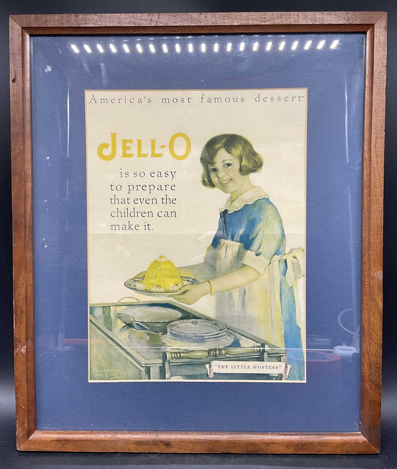 Framed 1926 Jell O Print Ad Little Hostess: Framed and matted print advertisement lithograph. Jell O. The Little Hostess. Published circa 1926. Wood frame. Not examined out of frame. Frame measures approx. 17.5 x 14.75 inches. Wear including cr