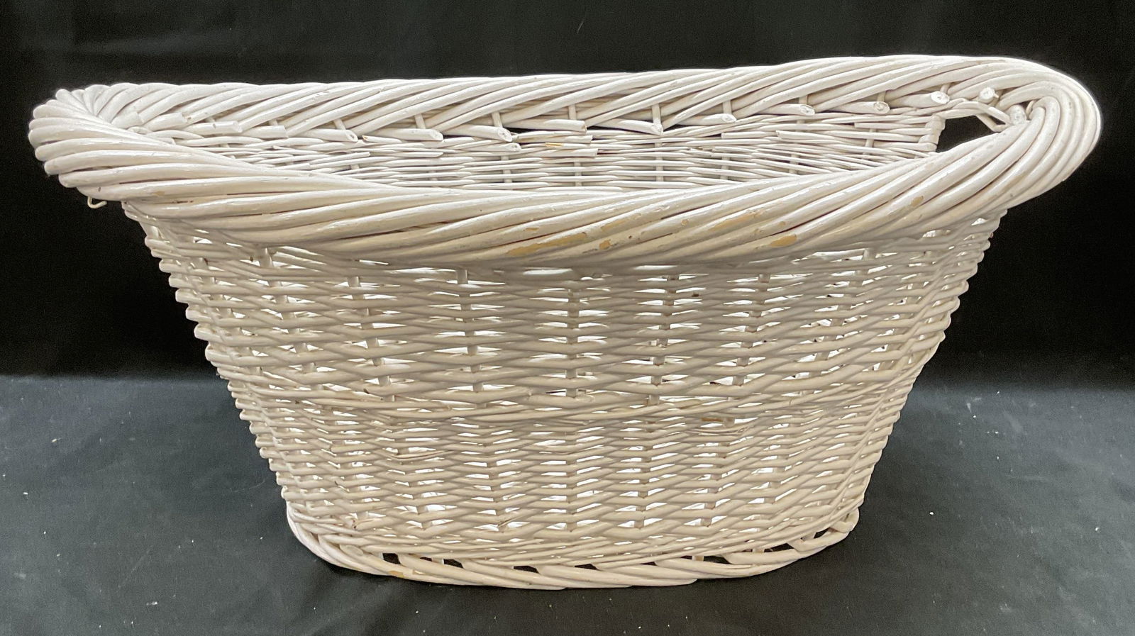 White Woven Wicker Wood Basket 24 In Wide: White woven wicker wooden basket with handles. Measures approx 24 x 18 x 10.5 inches. Some loss to paint. Wicker basket, white wicker basket, wood basket, woven basket, home decor, home accessories, t