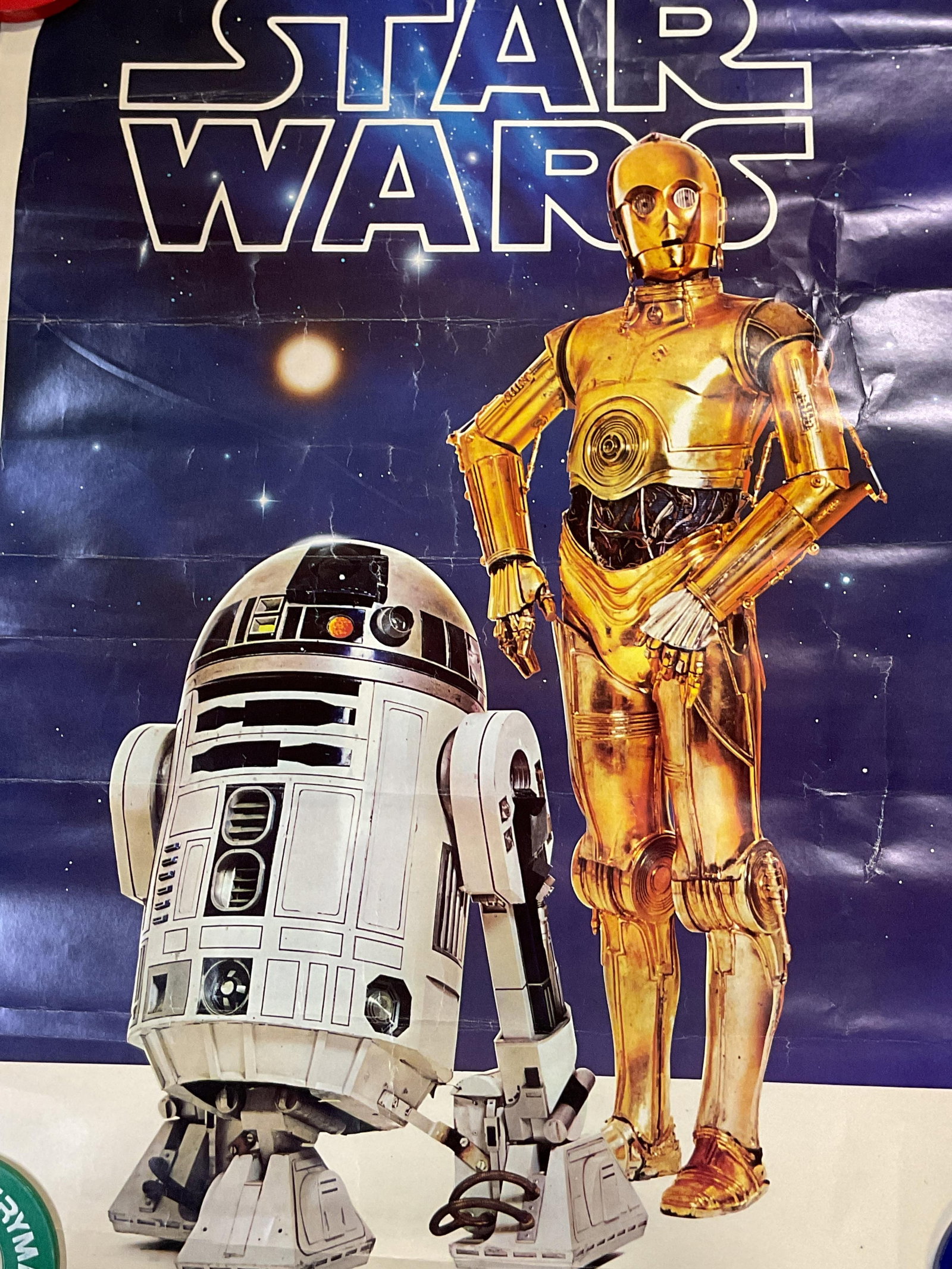 1977 Factors Droid Star Wars Movie Poster 28in: Factors Droid Style Star Wars movie poster. Features characters C-3PO and R2-D2. Reads Star Wars on top. Surface on bottom reads Factors Etc. Inc Bear Del USA Image Factory Inc Hollywood Calif 1977 Tw