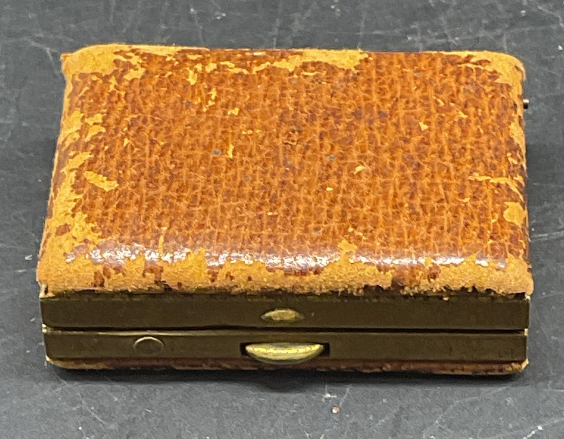 Vintage Brass & Leather Pill Trinket Box: Vintage brass leather covered pill trinket box. Measures approx. 1.5 x 1 1/8 x .5 inches. Some scratching and losses. Brass trinket box, leather trinket box, home decor, home accessories, table decor,