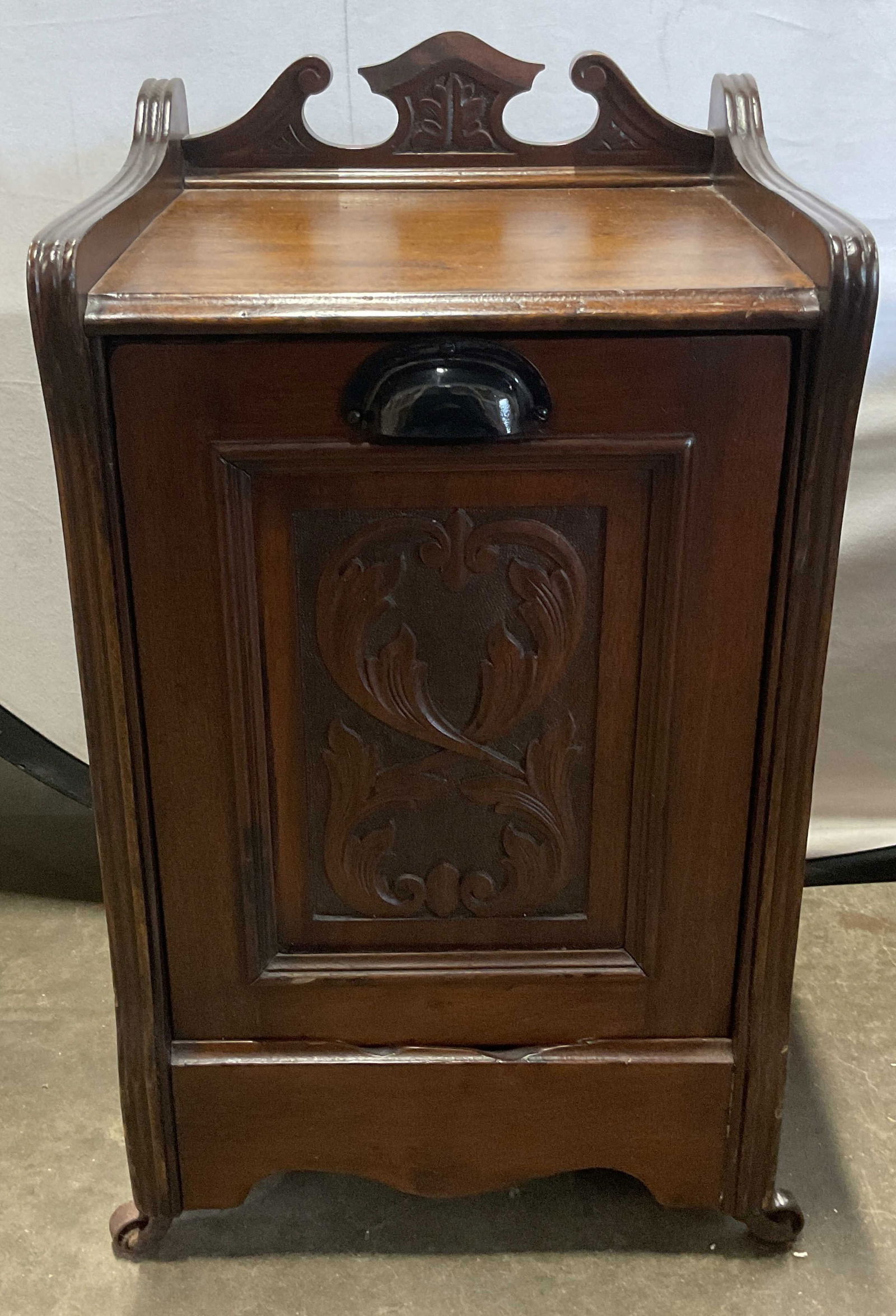 Antique Wood Coal Scuttle Cabinet 25in: Antique wood coal scuttle cabinet. Ornate carved panel door. Casters on base. Measures approx. 14.25 x 13 x 25 inches. Modern hardware. Some scratching and splitting. Antiques, collectibles, antique c