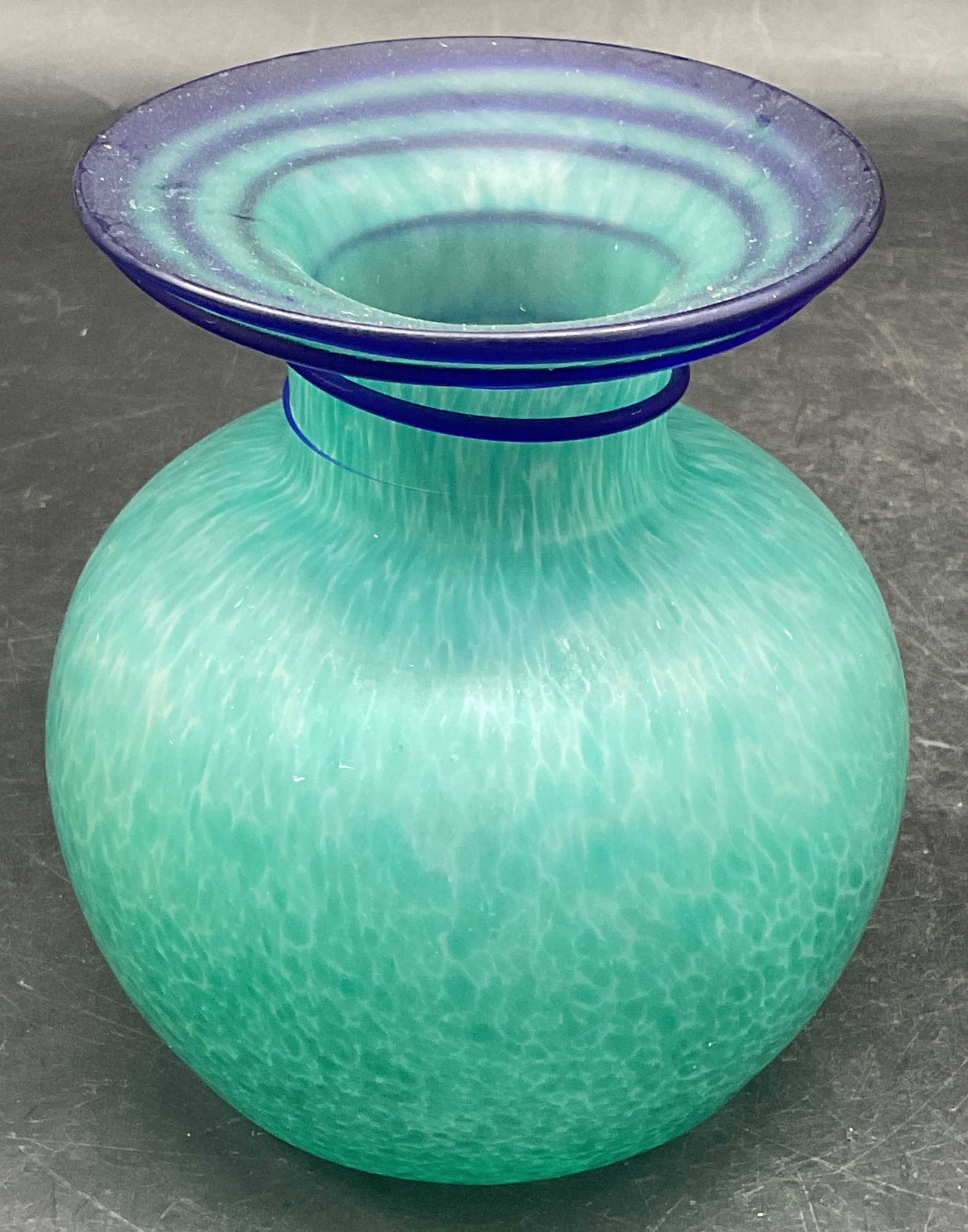 Teal Blue Mottled Art Glass Swirl Vase: Teal mottled art glass vase with applied cobalt blue swirl. Measures approx. 4.25 x 5 inches. Some scratching. Art glass vase, blue vase, swirl vase, home decor, home accessories, table decor, table a