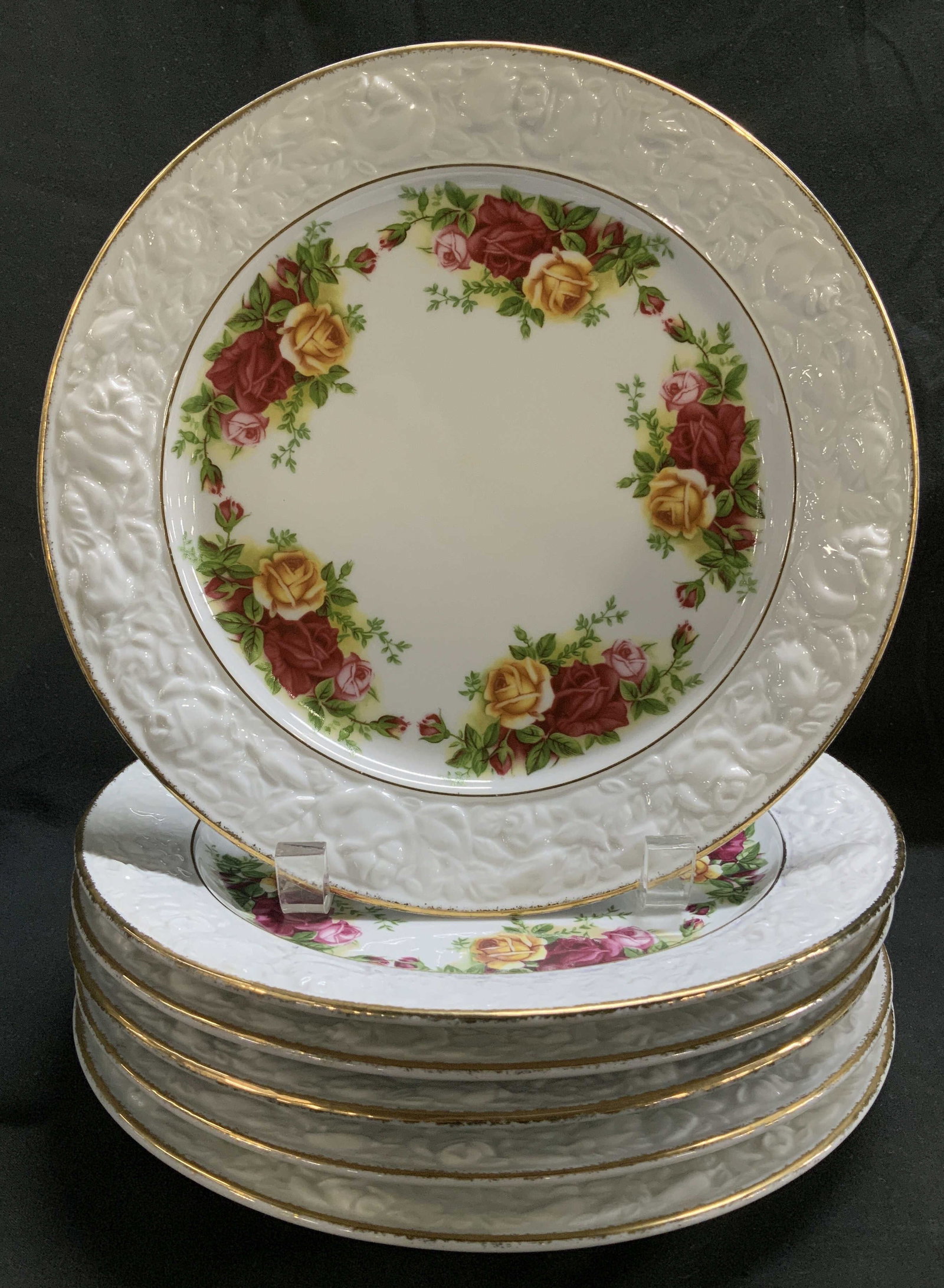 Set 6 Royal Albert 1962 Old Country Roses Plates: Lot includes, set 6 of 1962 Royal Albert Ltd. plates feature vibrant floral motifs & embossed pattern on border. Gilt accents. Fine bone china material. Signed & marked on underside. Reads, Old Countr