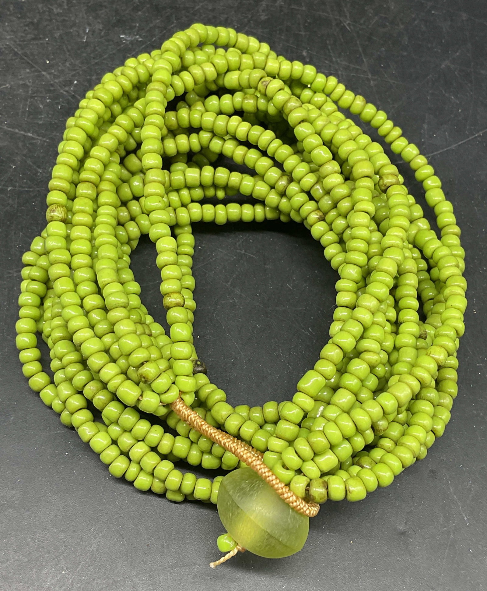 Vintage Bright Green Beaded Necklace: Vintage bright green faux stone beaded multi strand necklace. Drop length approx 7.5 inches. Some scratching. Jewelry, estate jewelry, costume jewelry, cocktail jewelry, fashion jewelry, accessories,