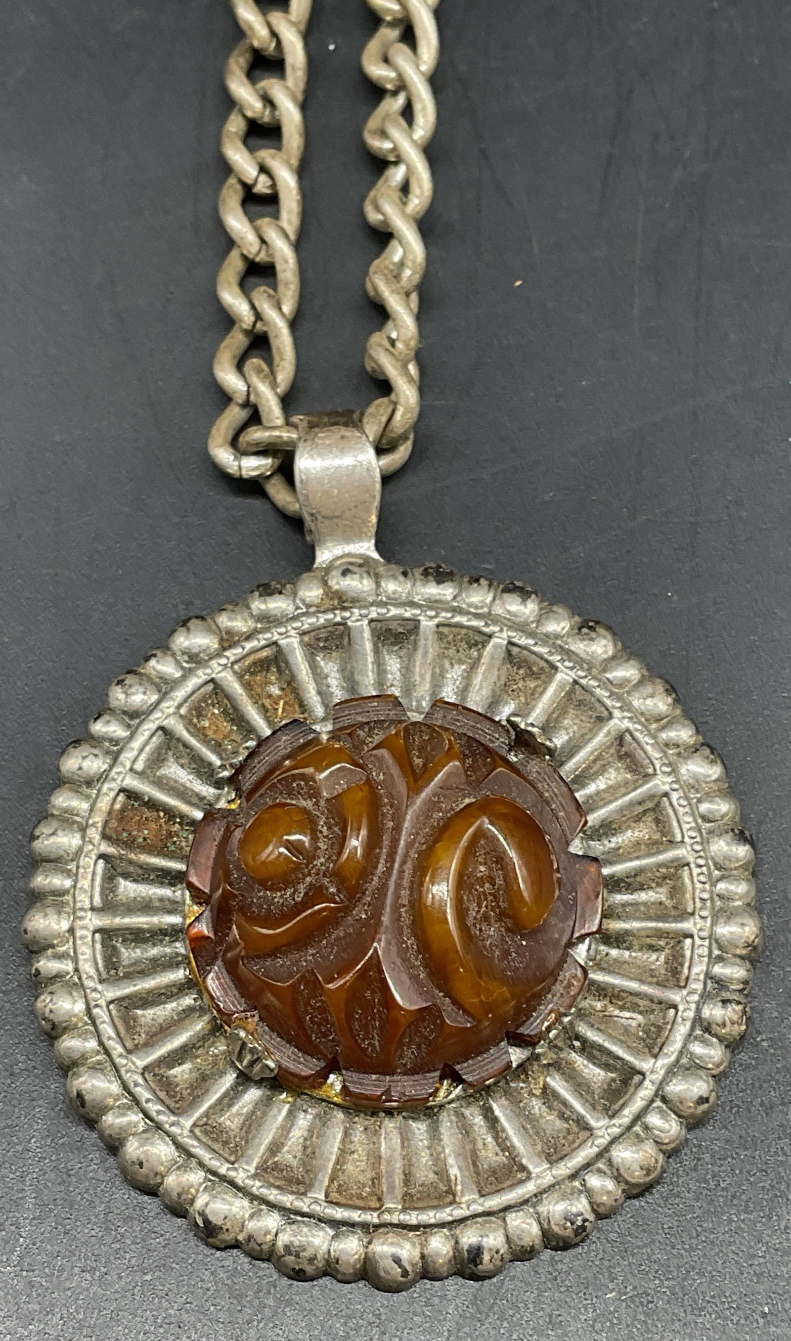 Vintage Silver Tone Lucite Pendant Necklace: Vintage silver tone pendant necklace with brown faux stone lucite. Drop length measures approx. 8 inches. Some scratching. Jewelry, estate jewelry, costume jewelry, cocktail jewelry, fashion jewelry,