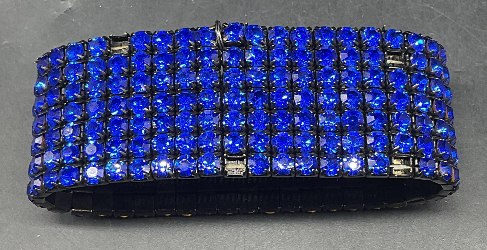 Mac Mode Blue Crystal Mesh Bracelet: Signed Mac Mode blue crystal mesh stretch bracelet. Measures approx. 2.25 inches wide. Some crystals need replacement. Some scratching. Jewelry, estate jewelry, costume jewelry, cocktail jewelry, fash