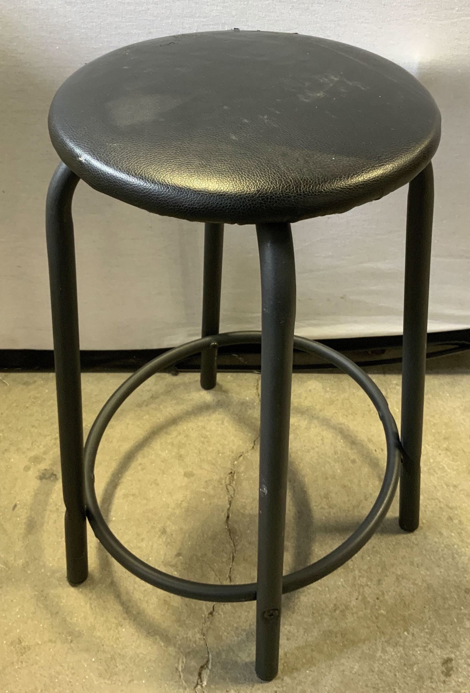 Vtg Faux Leather Stool 20in: Vintage stool features a faux leather seat & circular footrest. Metal material. No visible signature or markings. Surface wear consistent to age, use & exposure. Measurements: length 12in x width 12in